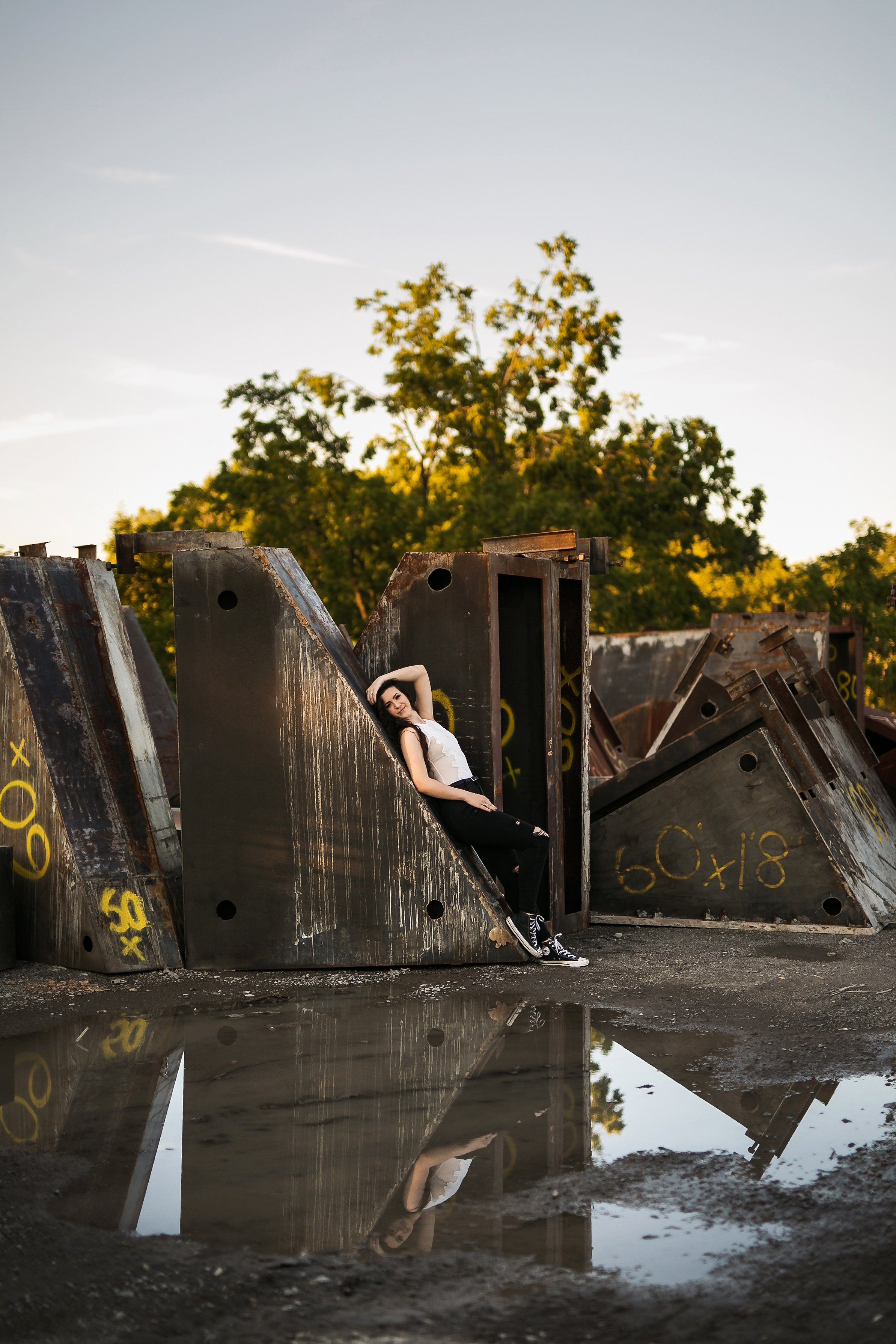 BHS senior poses with concrete structure