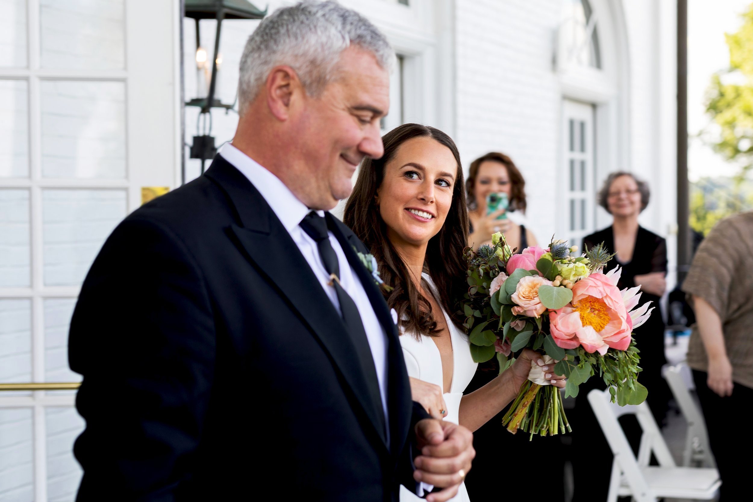 Bride looks at dad