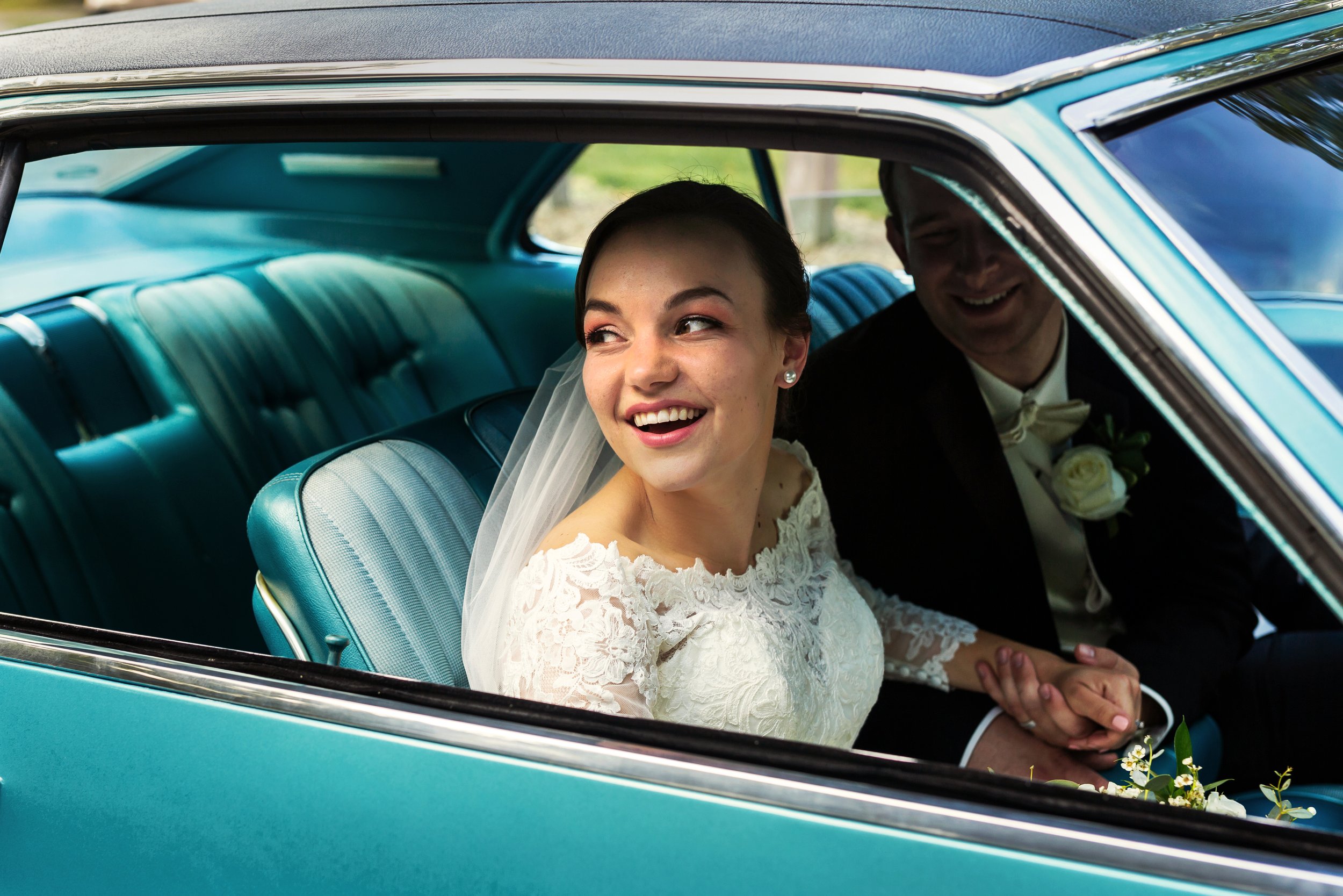 bride in classic car