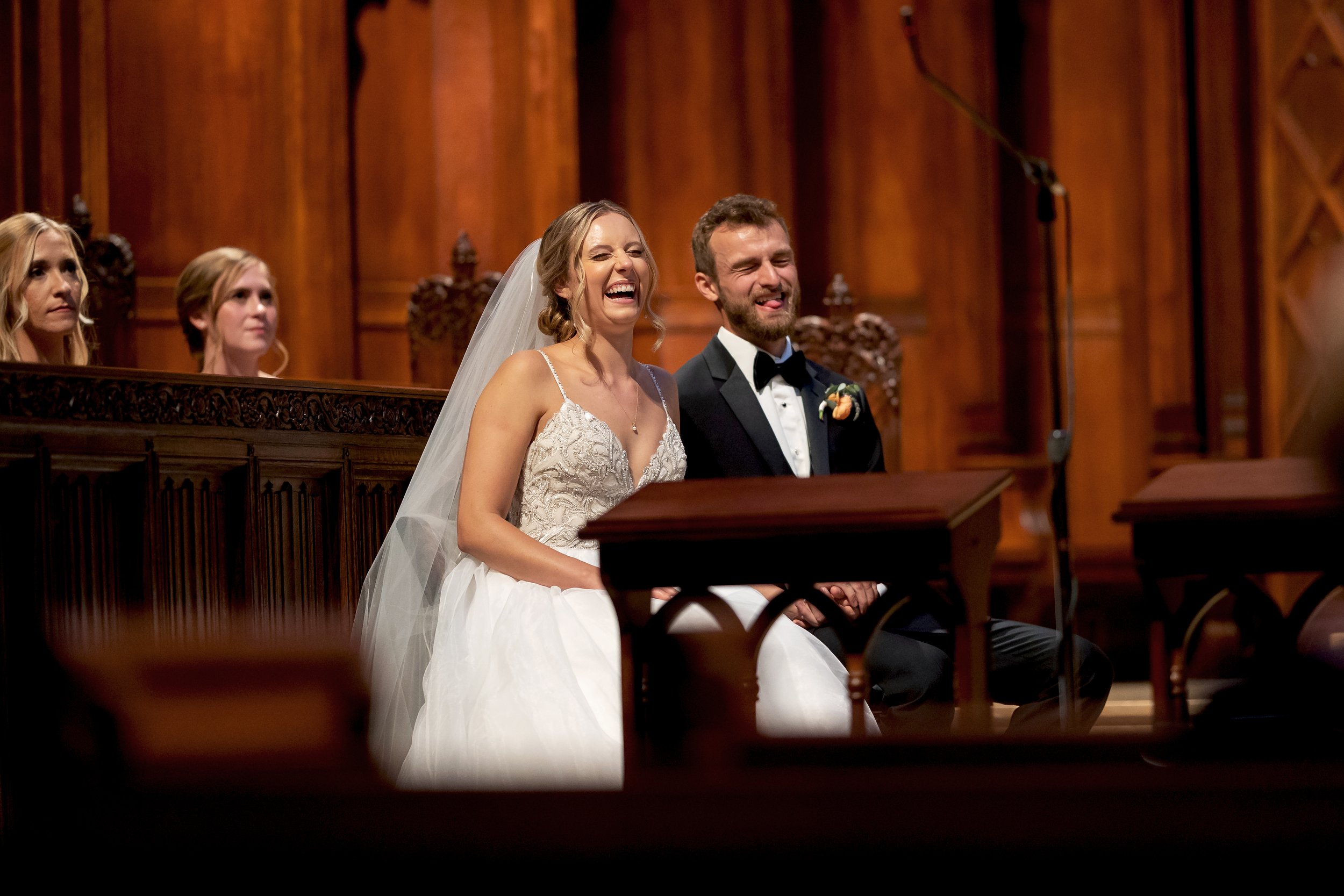 couple laughs during their ceremony