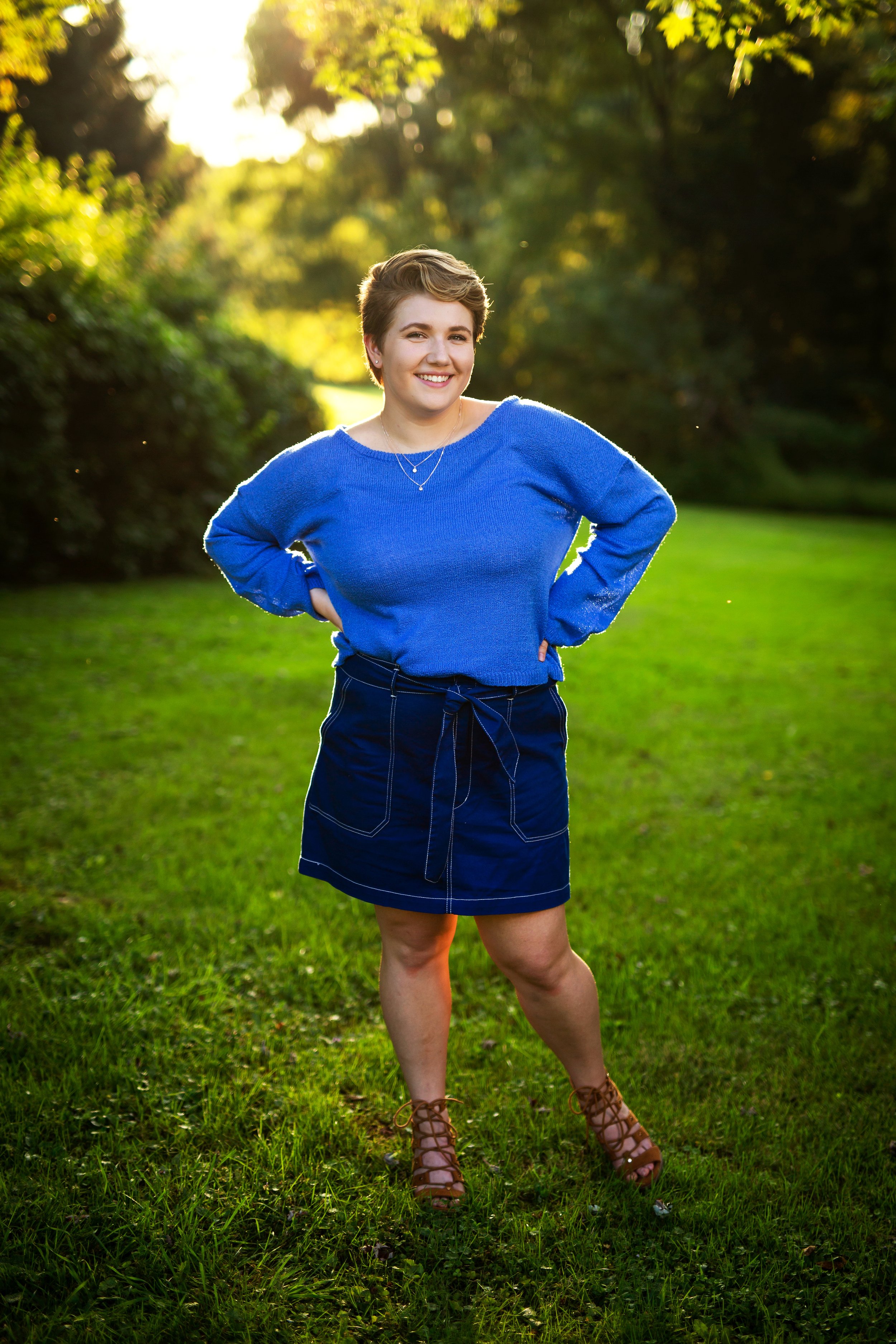 Senior portrait during sunset 