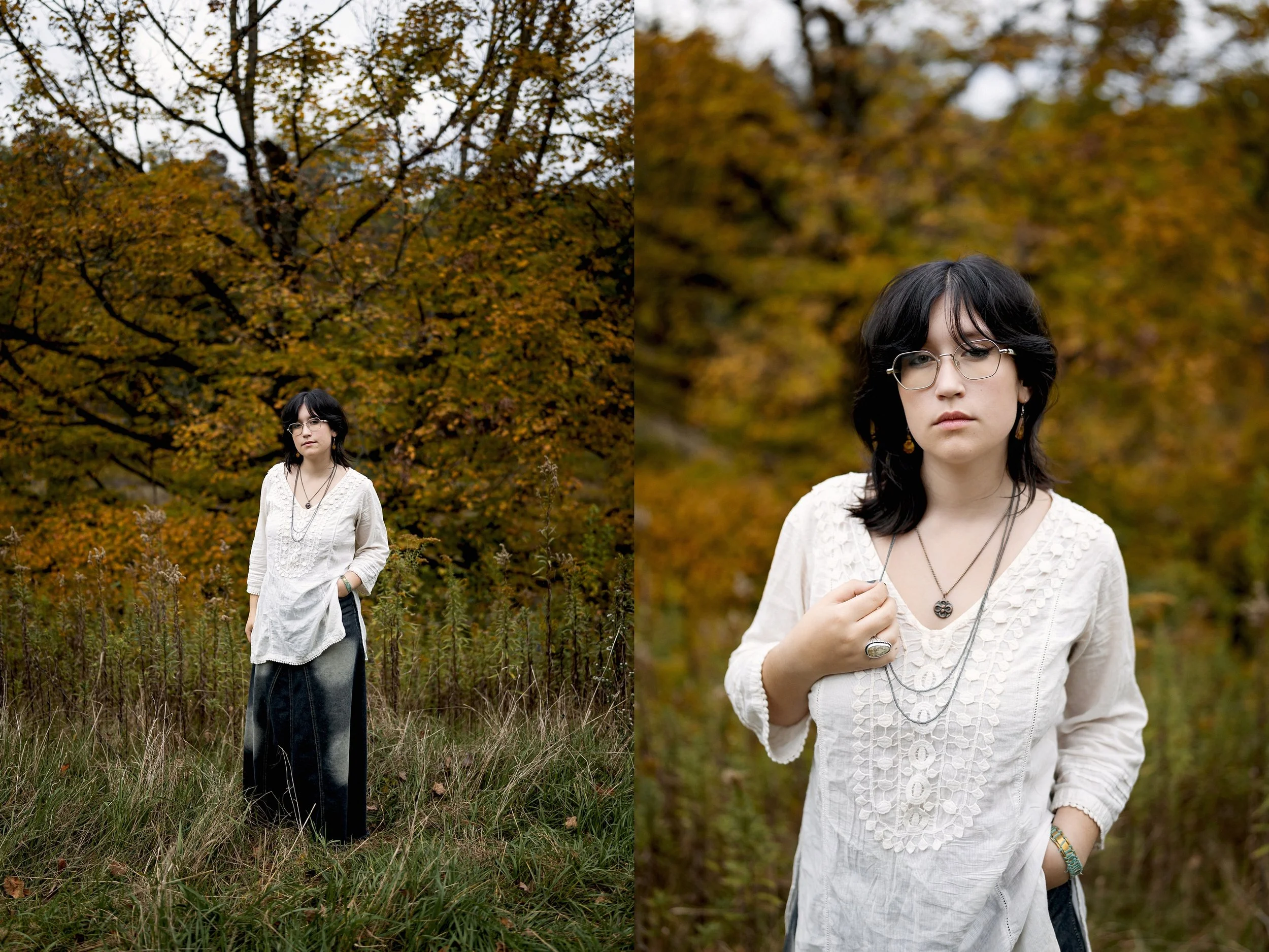 alternative high school senior girl stands in a field in front of a golden yellow tree at churchill valley greenway. It is autumn and she is wearing a denim skirt and a boho blouse with a serene look on her face