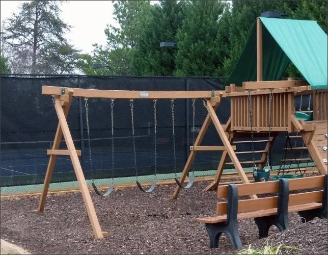 An example of Non-Public Use Equipment: note that the swingset structure is sagging.