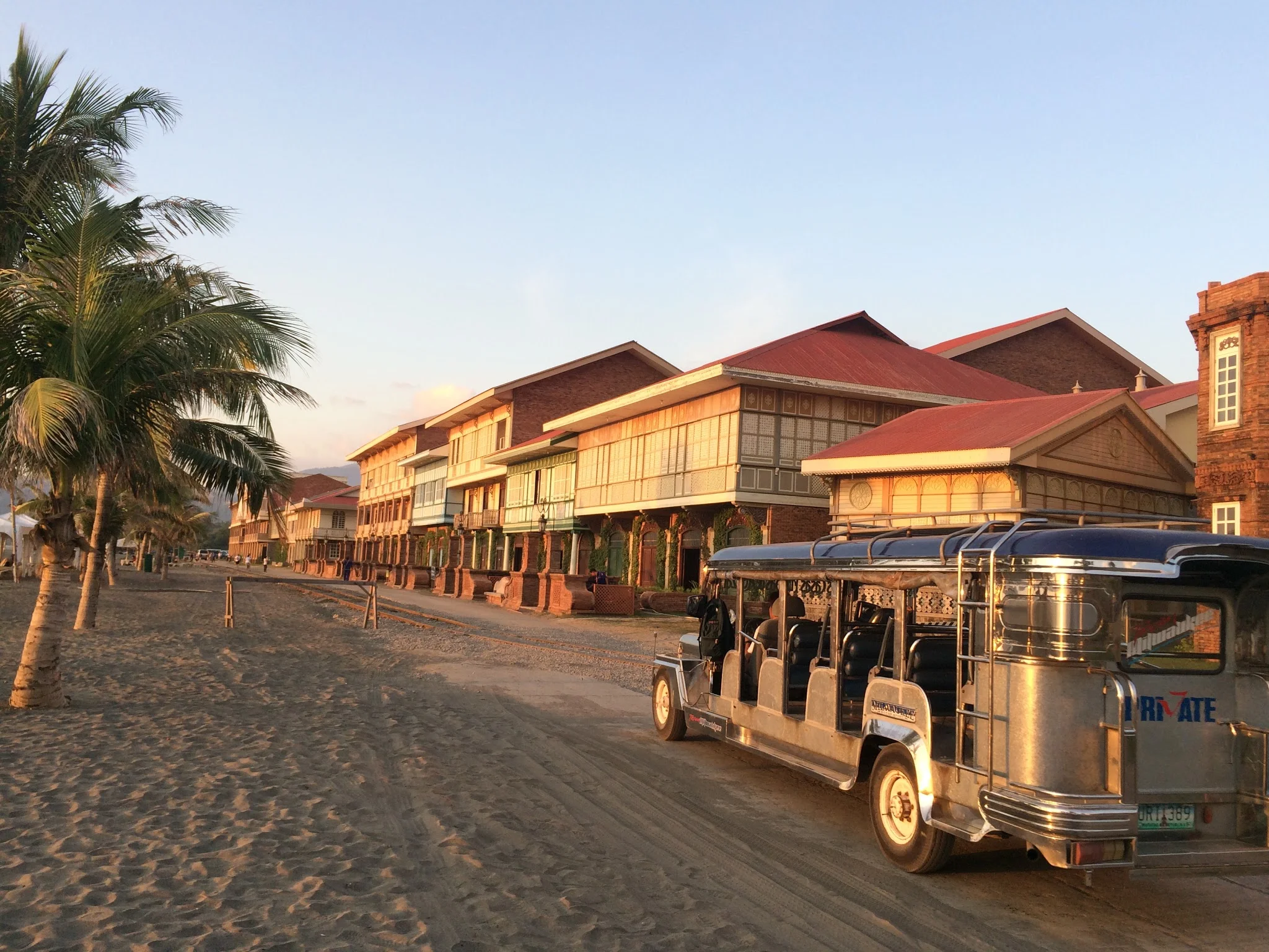 Hotel rooms on the beach and the resort jeepney shuttle