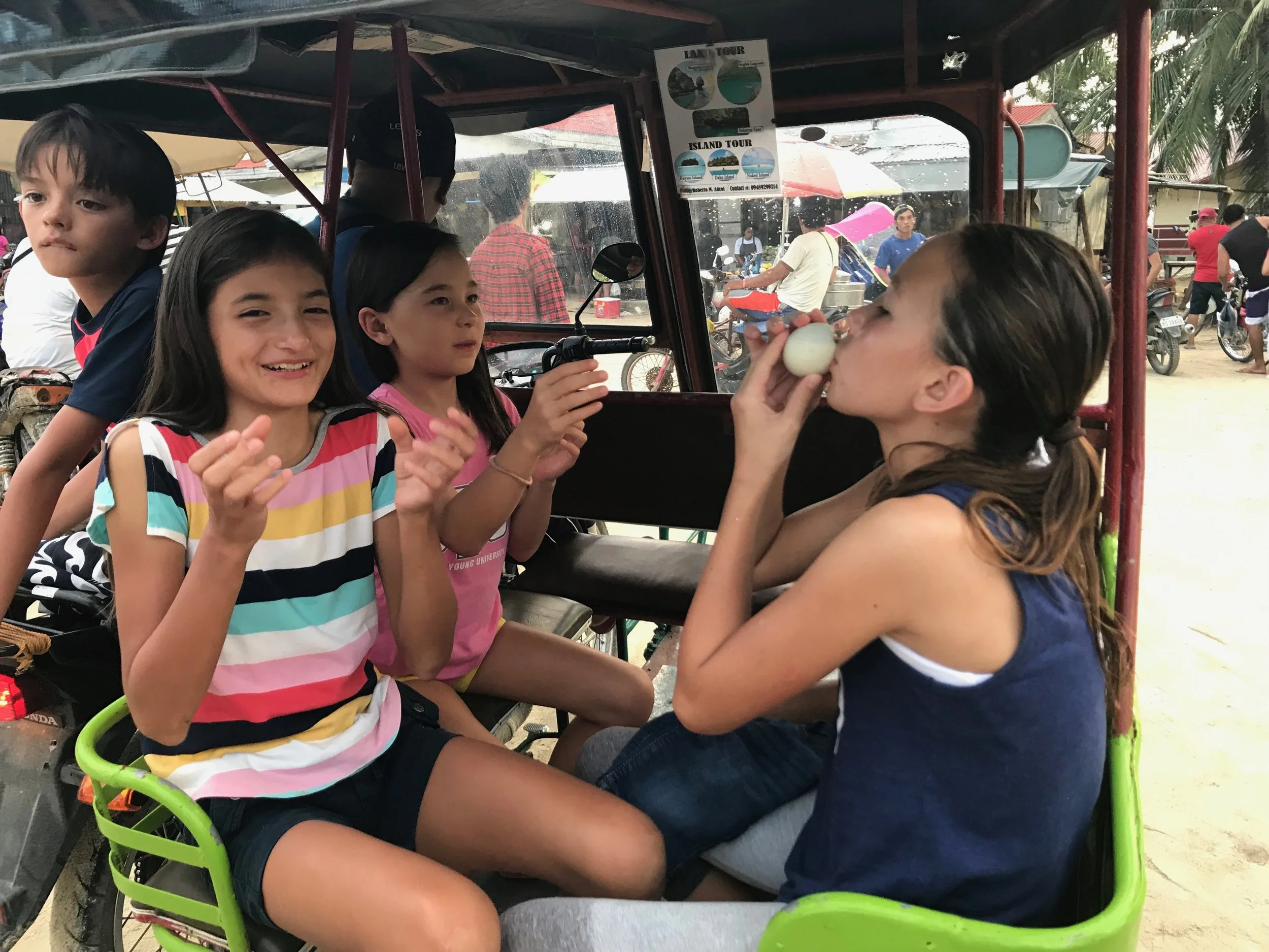 On a tricycle with some balut