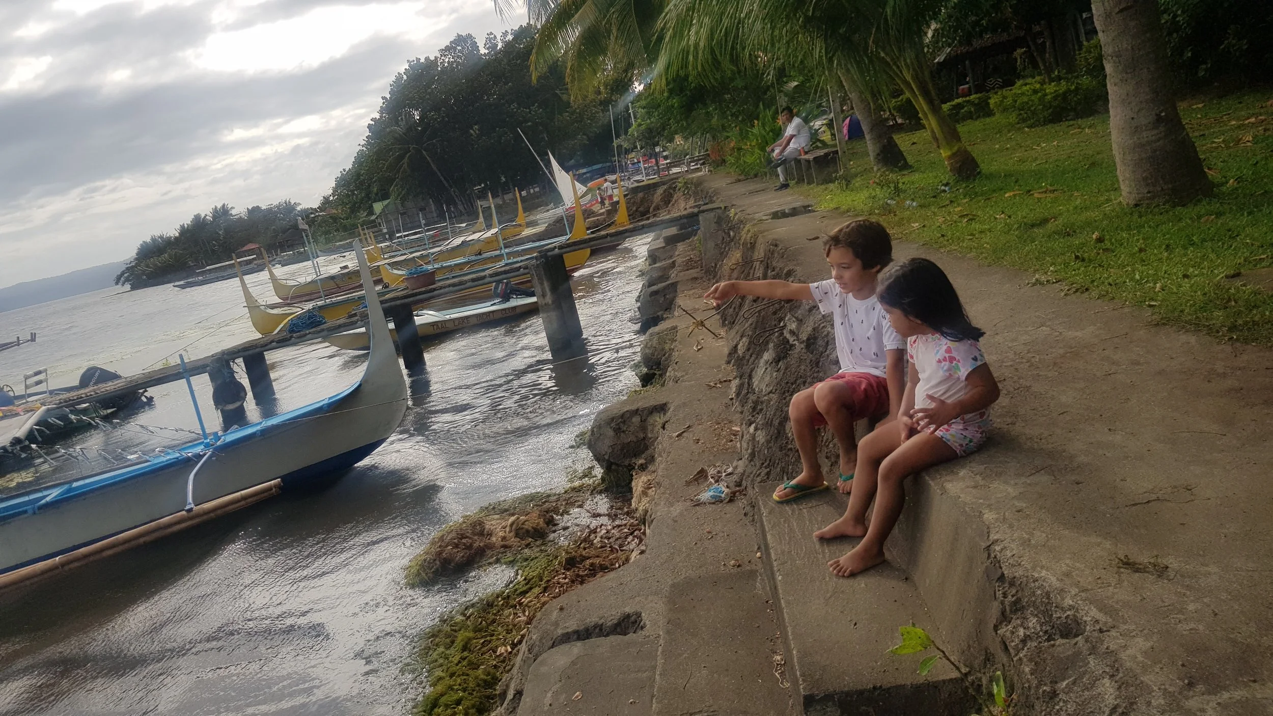Kids enjoying the view from Taal Lake Yacht Club