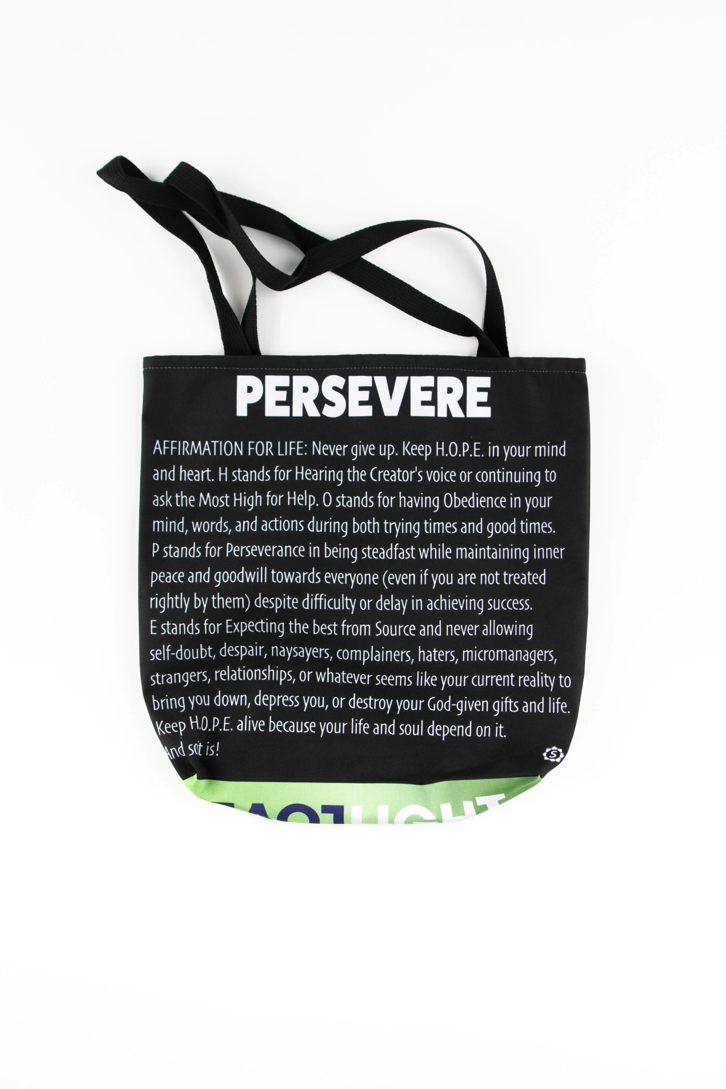 Back of the Wand tote bag showing bold white text on a black background with the word “PERSEVERE” at the top and a full written life affirmation printed below.