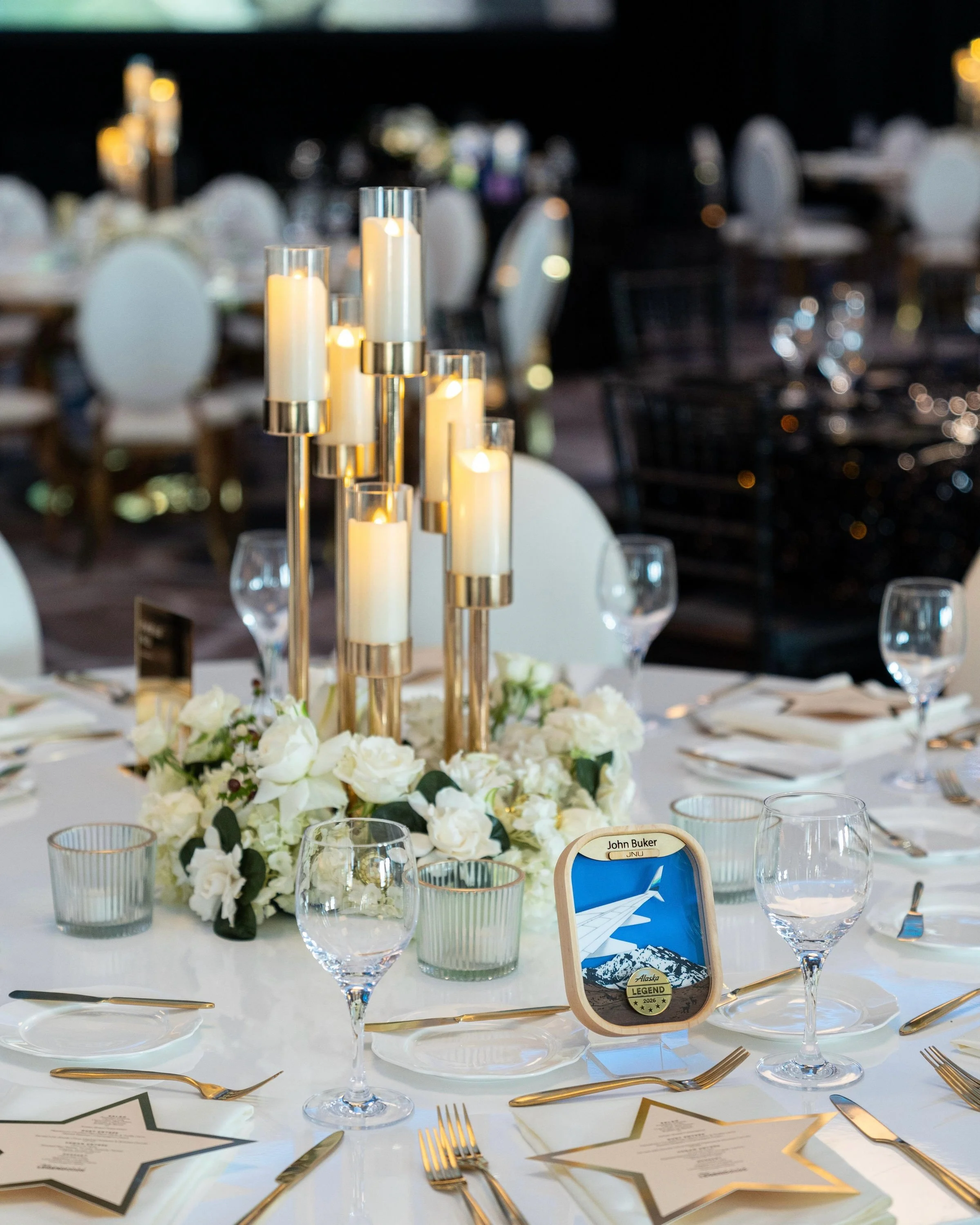 I recently had an opportunity to create custom recognition pieces for the Alaska Airlines LEGENDS 2026 event.

Each custom plaque was designed to look like an airplane window view, with a scene inspired by what you might see while flying into the por