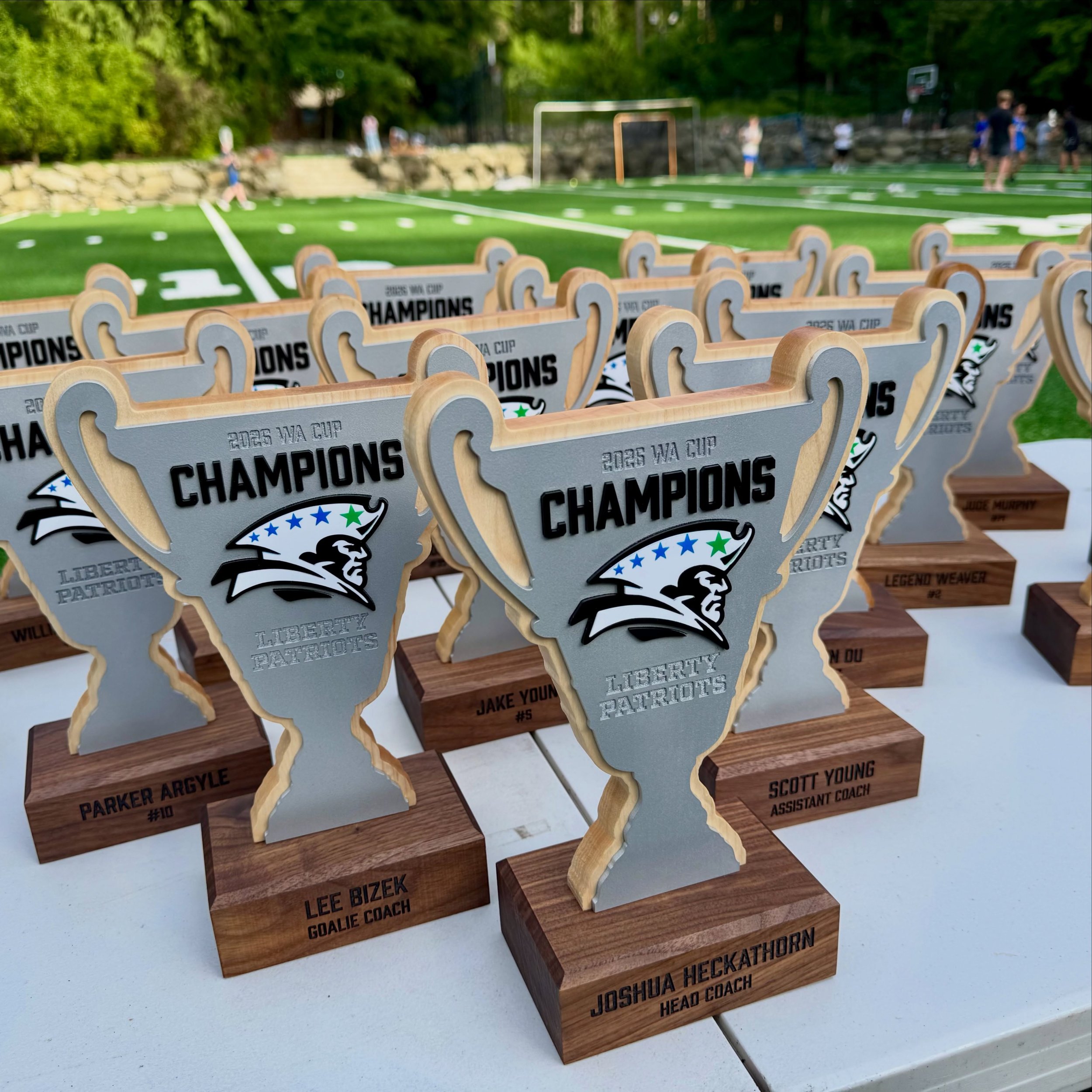 Custom trophies for the Liberty Patriots 5/6 WA Cup Champions. 🏆

The team brought home the WA Cup, so I wanted to make something special for the players to remember it by.

Each trophy was built with a custom WA Cup silhouette, maple trophy body, s