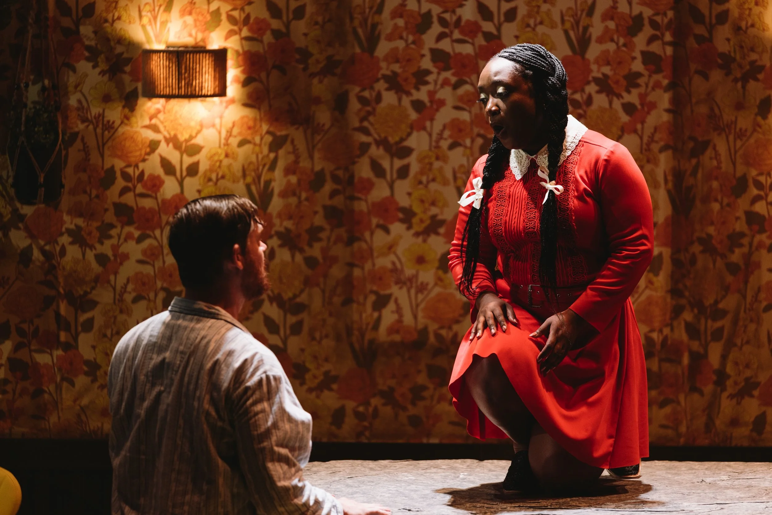 Salome singing to Herod from on top of the table.jpg