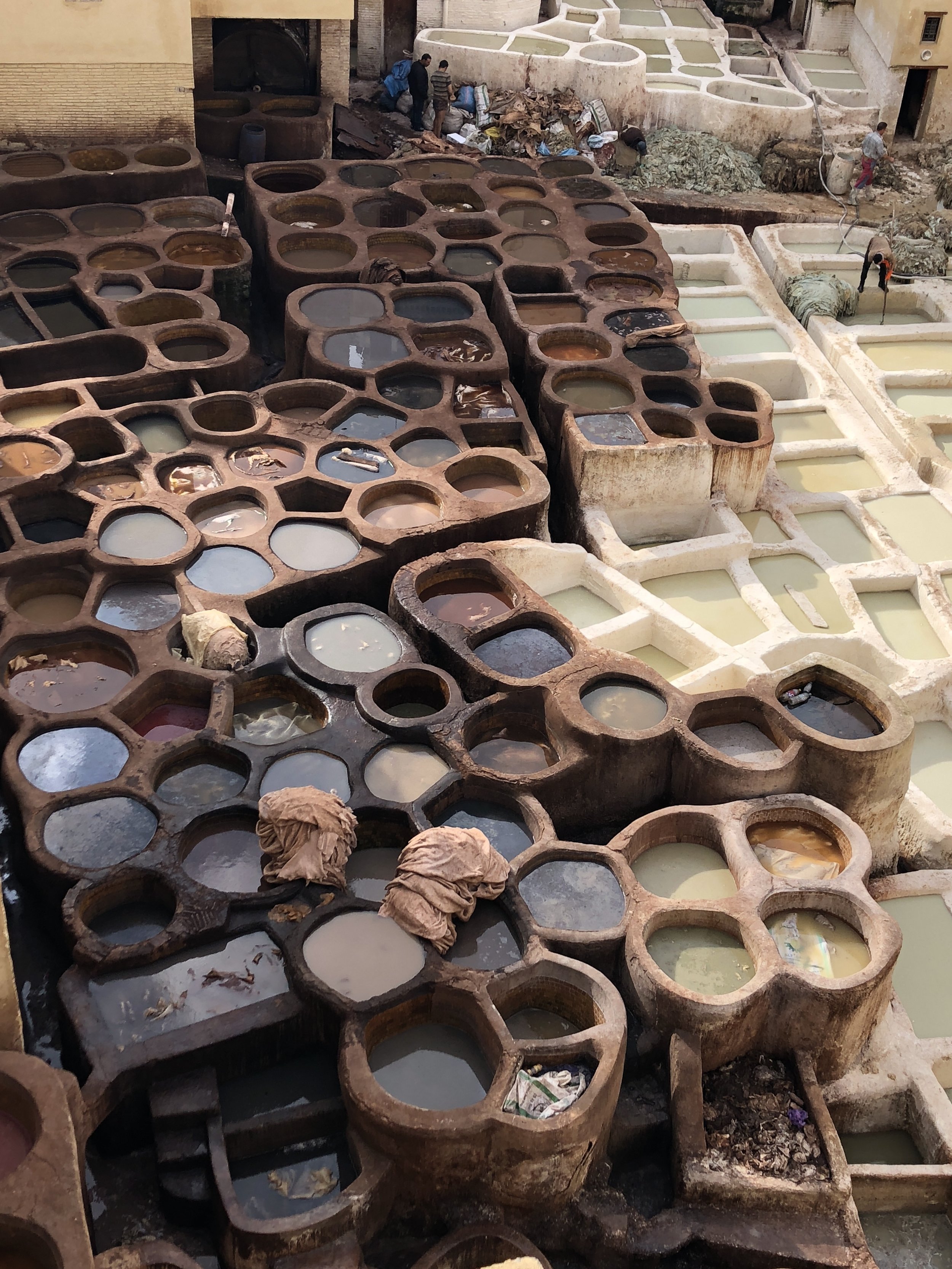  Acrid-smelling dye vats of the leather tanneries. 