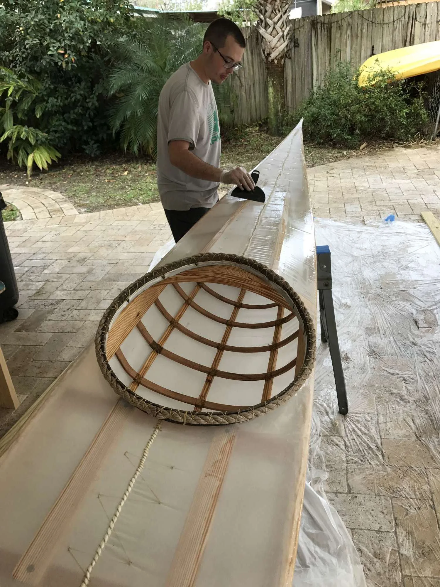 Tristan applying the coating
