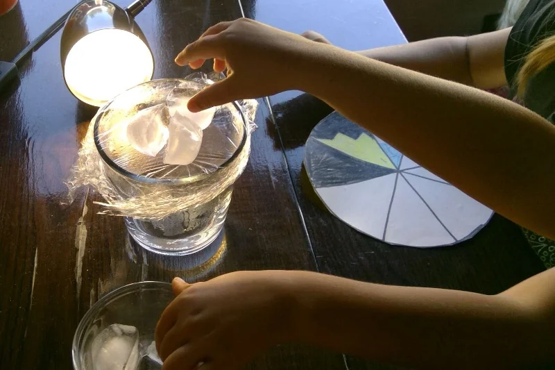 Attempting to ‘make’ a cloud with boiling water, ice cubes and a light.