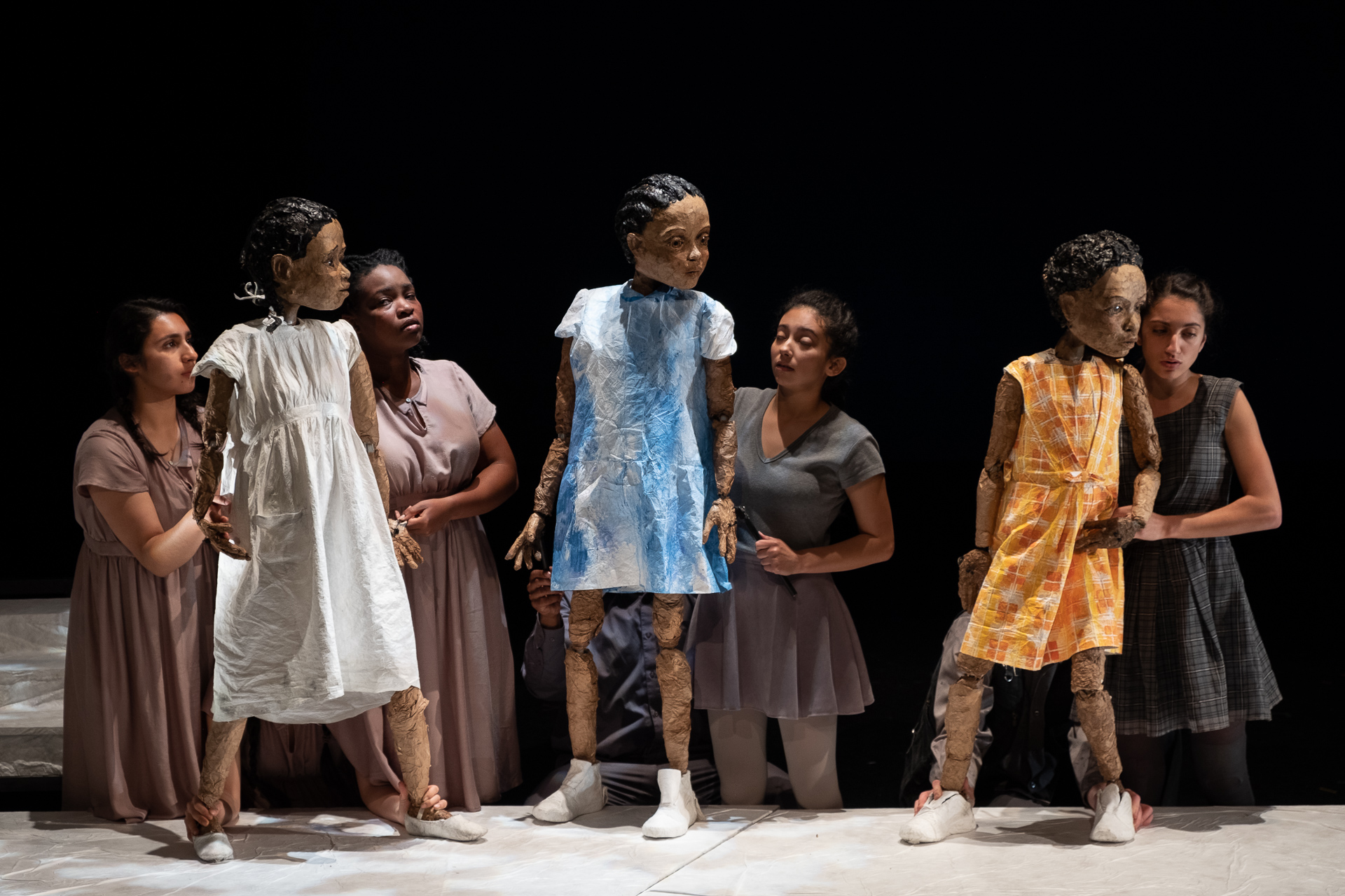 The Bluest Eye tells the story of Picola, a black girl caught in tragic circumstances. Her best friend narrates her own search for the source of responsibility and for an understanding of her own part in the story. The production interrogates how i