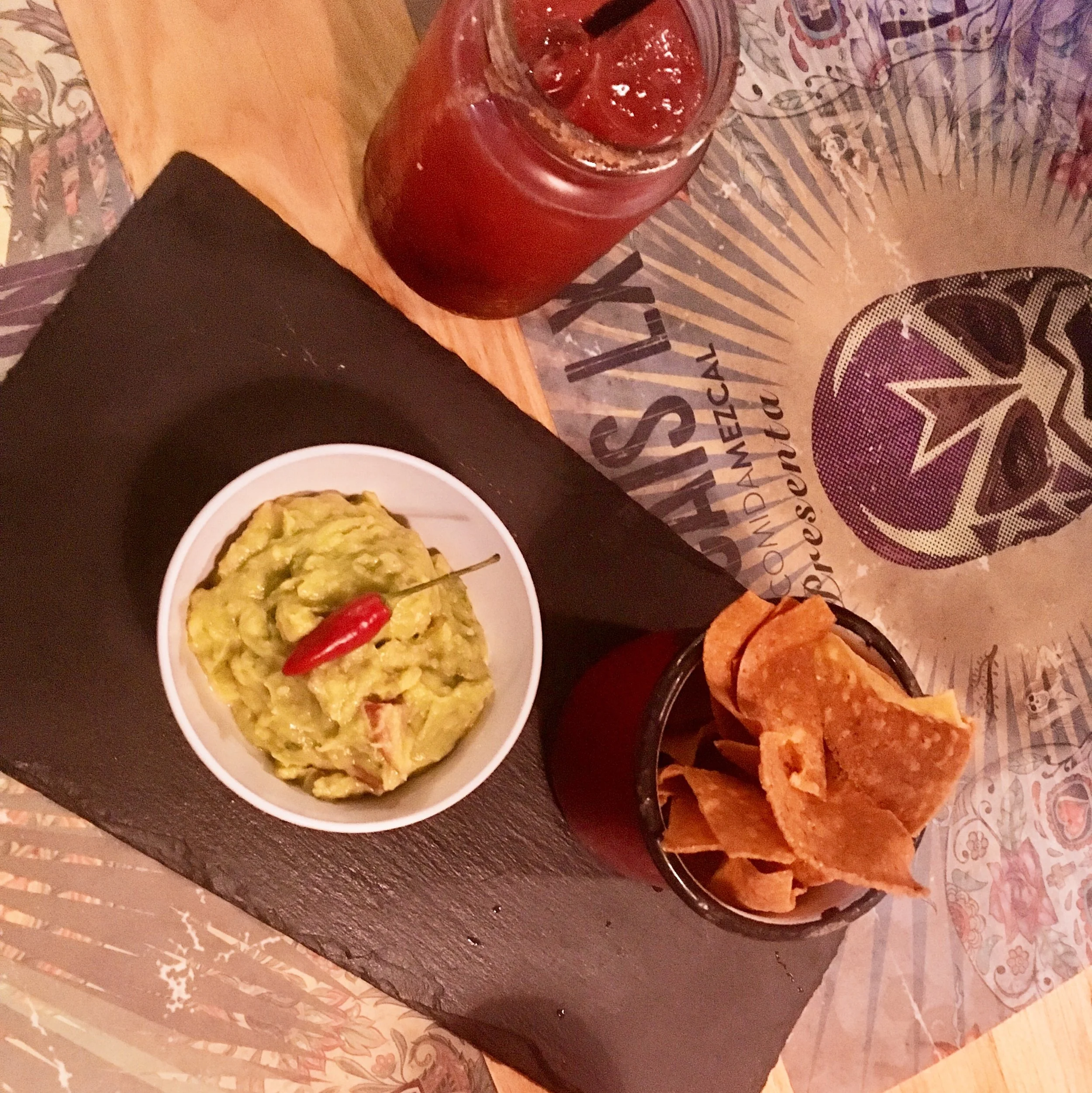 Guacamole and neon cocktail at Mez Cais LX