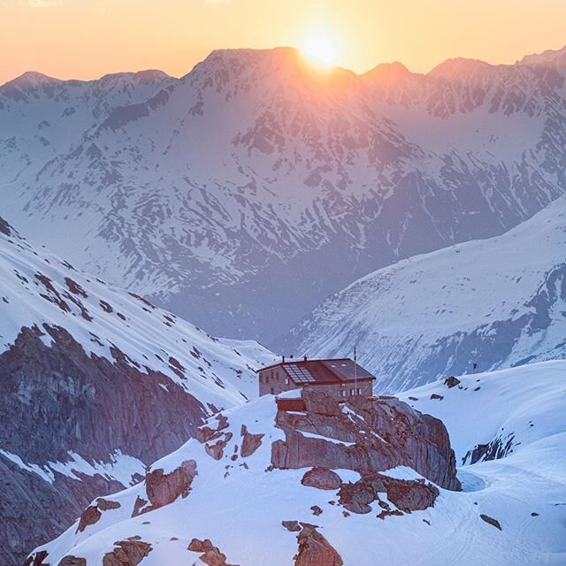 sunrise over Albert-Heim-Hut, deep in the Swiss mountains. Shot from a Heli