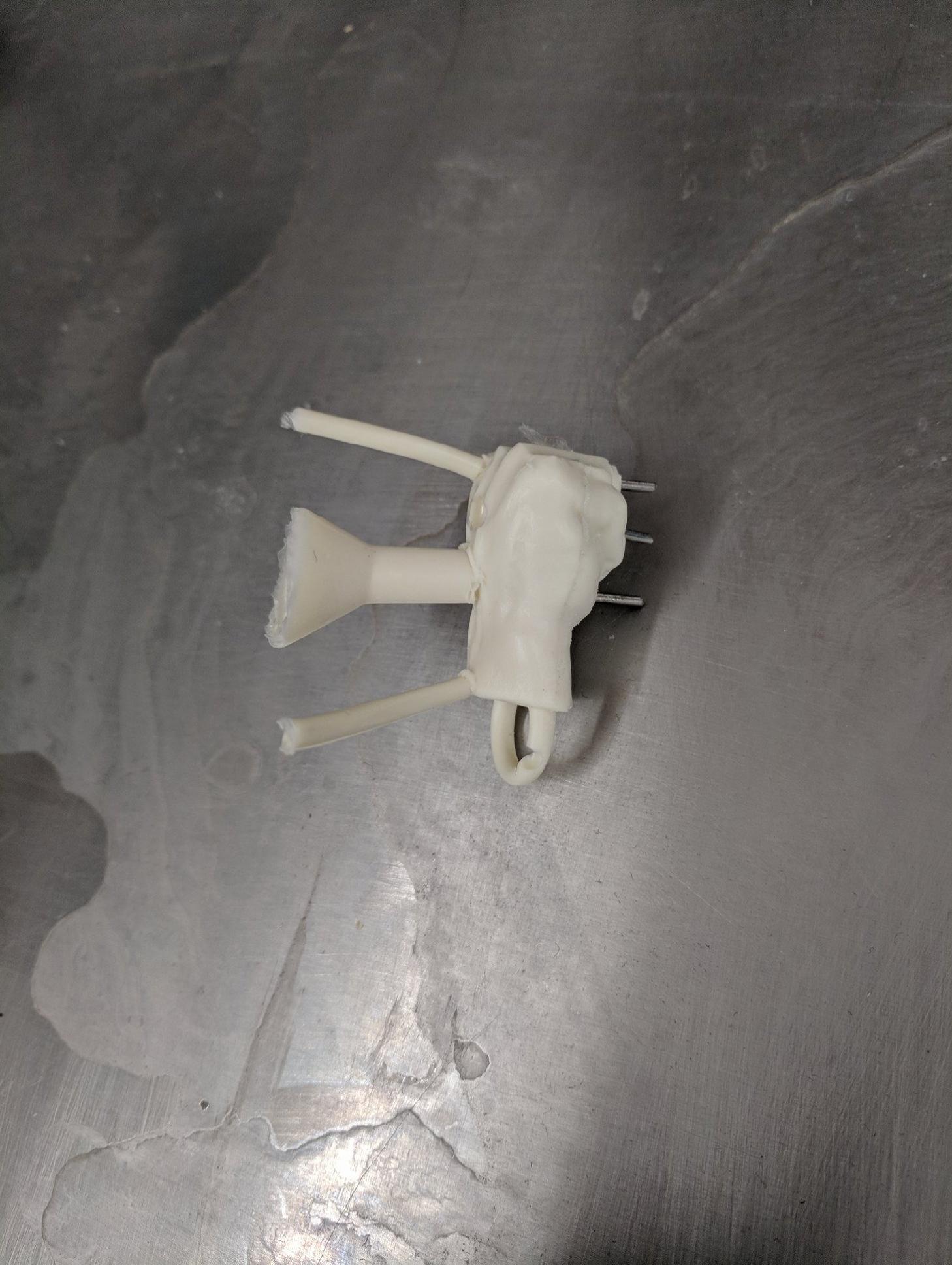  Weep holes and spout visible 