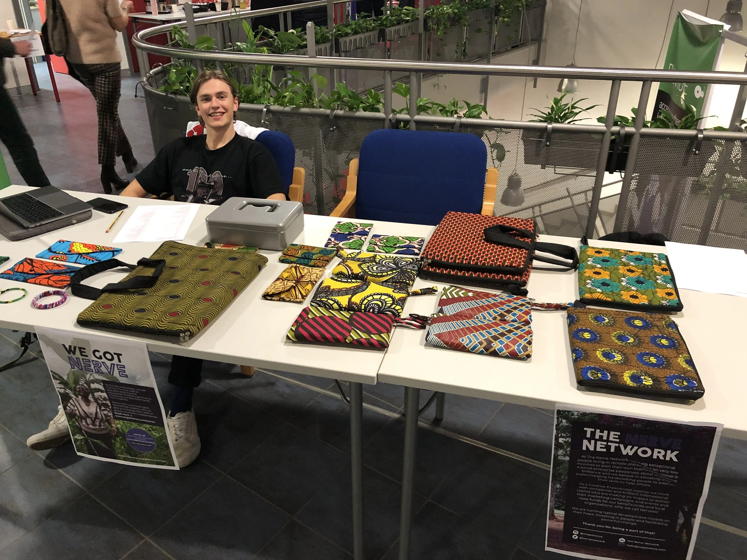 ISL Business Club member photographed selling the remaining items at a school event.