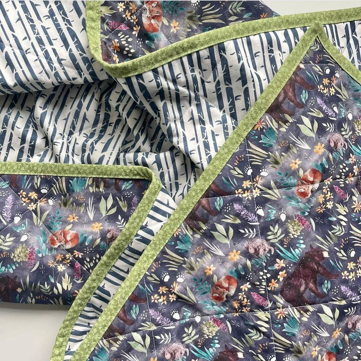 Take a look at this gorgeous, gorgeous quilt by @fiveminutespeaceshop 😍 using Lupine Forest in deep violet from @hawthornesupplyco. Thanks for bringing my design to life, I love to see it! ❤️ 
#babyquilt #surfacepatterndesign #watercolor #hawthornes