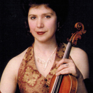 Araksia Nazlikian   Violin  Araksia Nazlikian began her violin studies at the age of 7 in Yerevan Armenia and received her BM from the Romanos Melikian Music College. She is an extremely active musician in various LA surrounding orchestras and has been teaching for over 20 years.