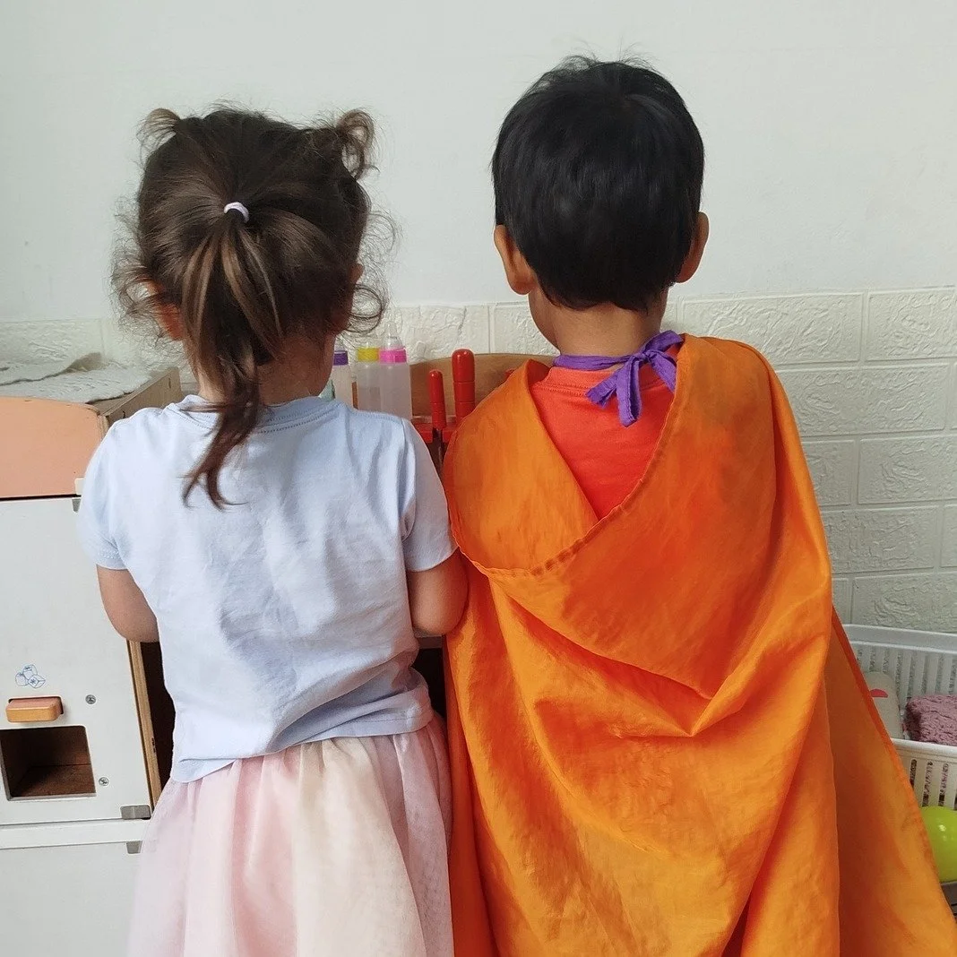 A piece of fabric becomes a cape, sand turns into food, and a few bricks become something entirely new. 🚀

What may look like simple play is actually symbolic play, where children begin to imagine, represent, and make sense of the world around them.