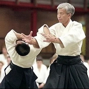 Moriteru Ueshiba (right), current Doshu of Aikido.