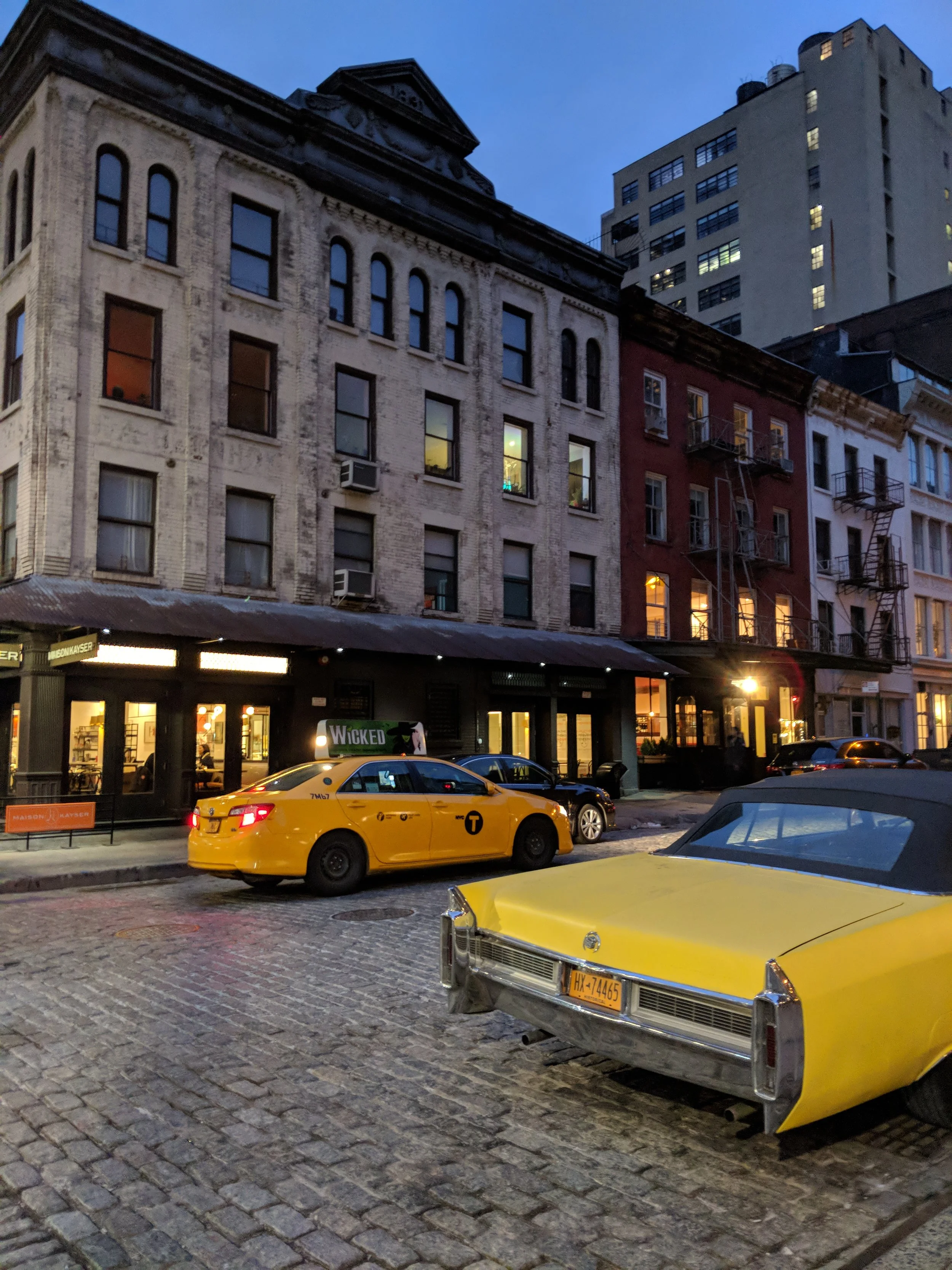 Taxi in Tribeca w a sweet lil Cadi on the sidewalk