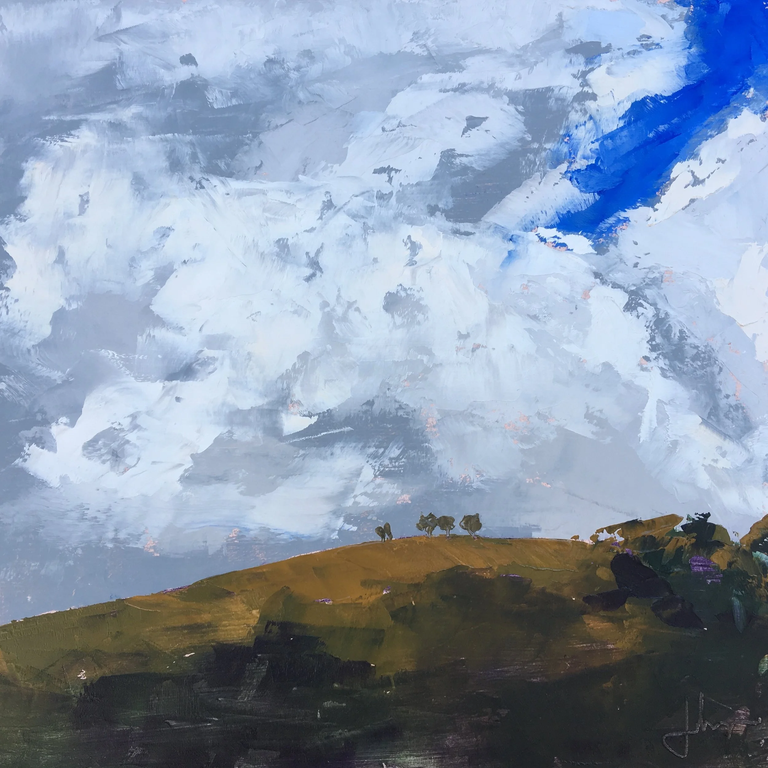 Clouds rise up on the days heat behind the "Bald Hill", Pyrenees