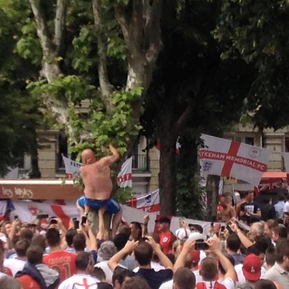England Fans rescuing beer from trees in France!