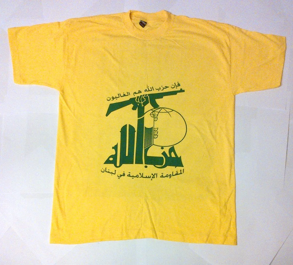 Hezbollah T Shirts...wearing them makes you bullet proof in Baalbek, as well as splash proof when painting your house.