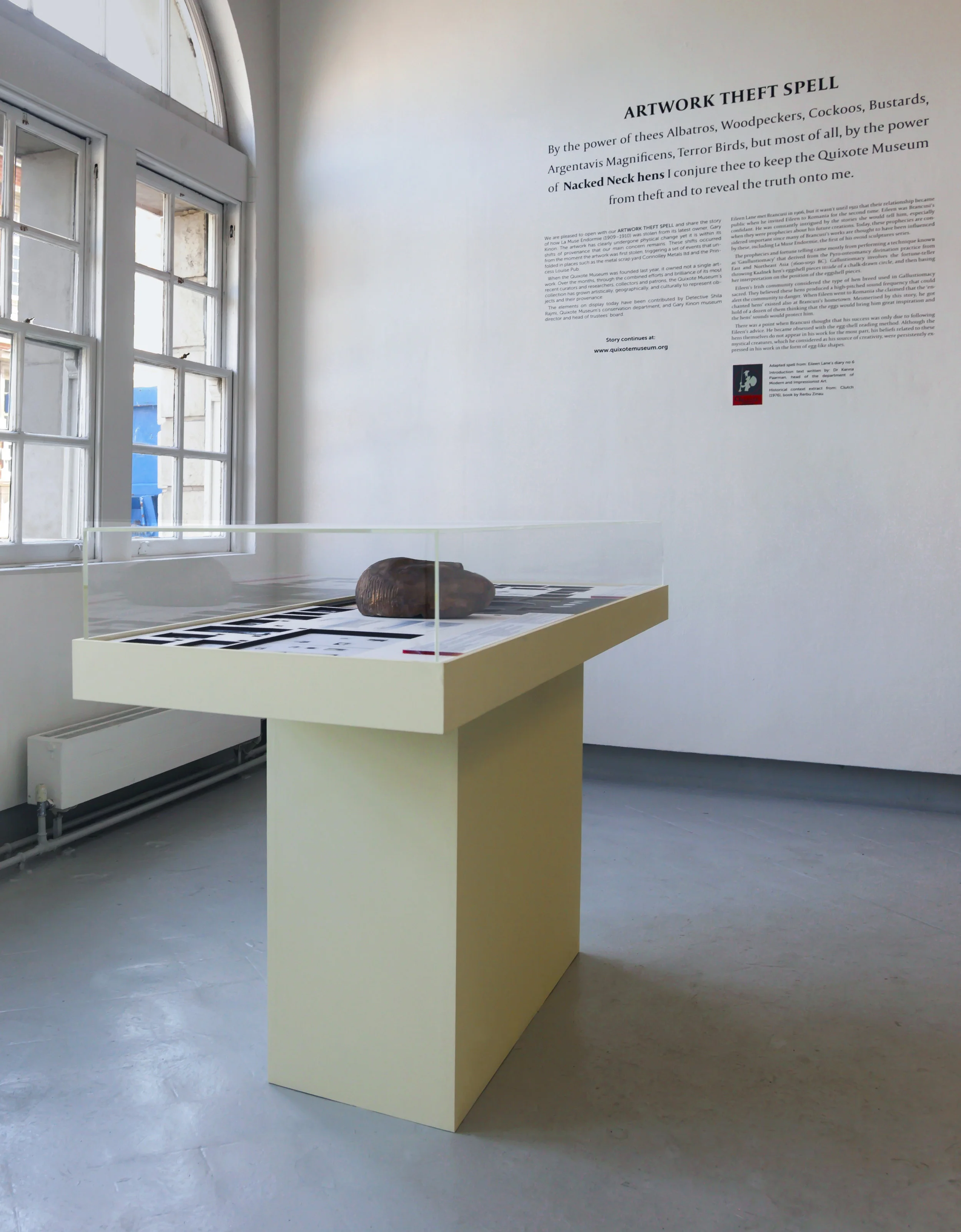 Artwork Theft Spell , installation composed of vinyl wall text, and display case. Intallation view from Chelsea College of Arts, Degree Show 2018.