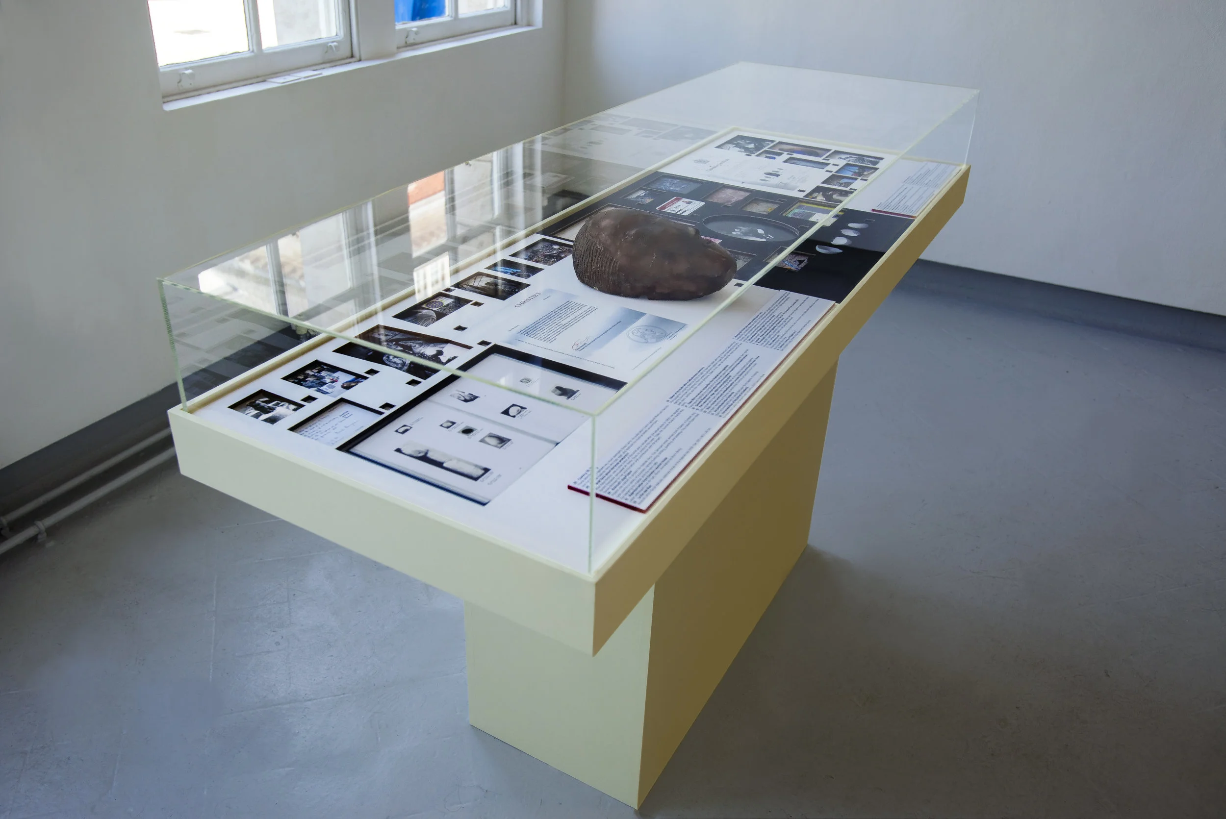 Artwork Theft Spell , display case component, 170 x 60 x 120 cm, MDF, fine art paper, copper, bronze, and kinetic mechanism, 2018.