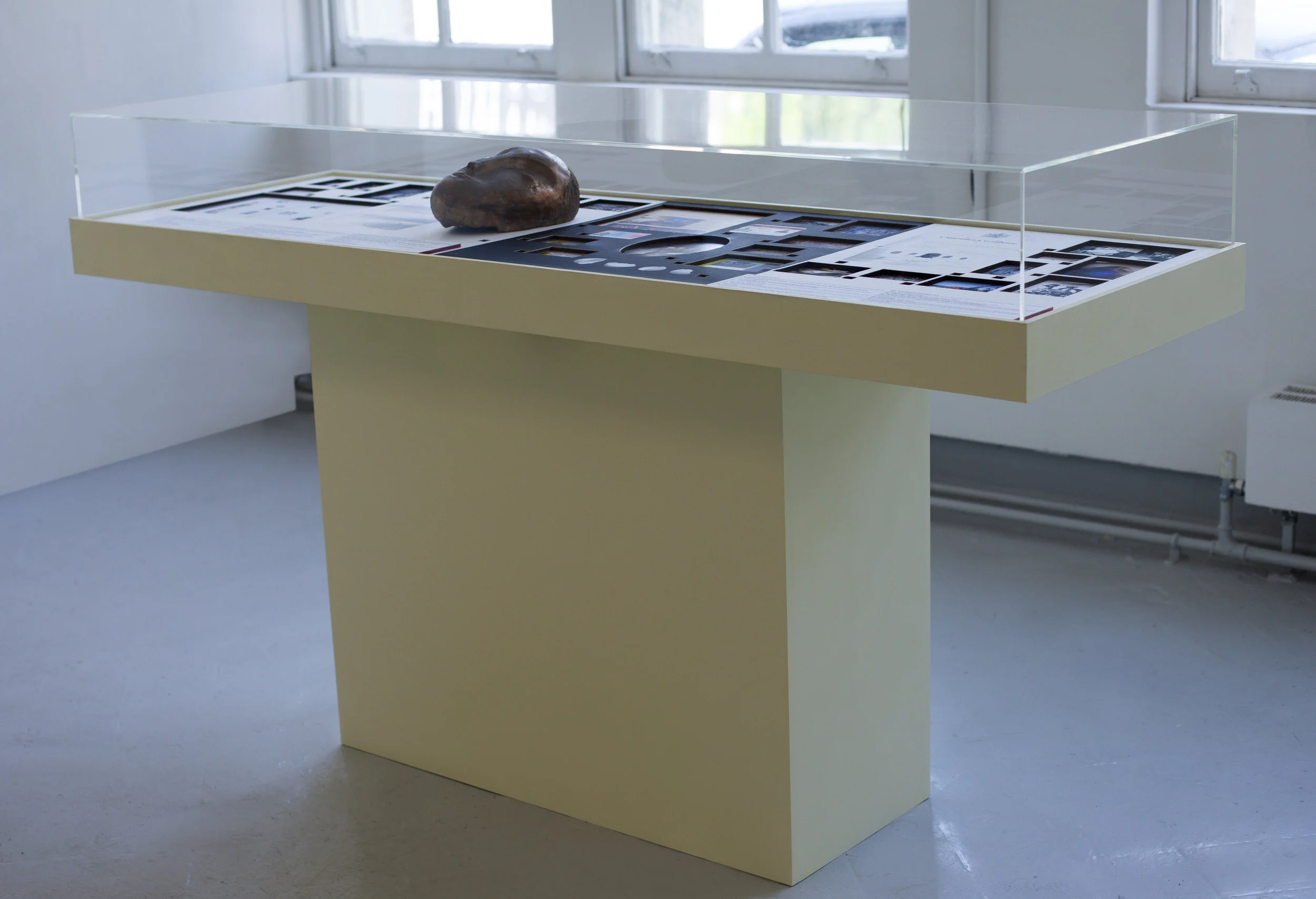 Artwork Theft Spell , display case component, 170 x 60 x 120 cm, MDF, fine art paper, copper, bronze, and kinetic mechanism, 2018.