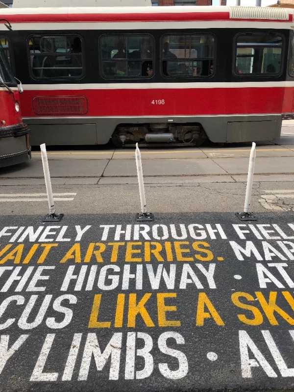PLANT Architects paint my poem "The City" on King Street, Toronto