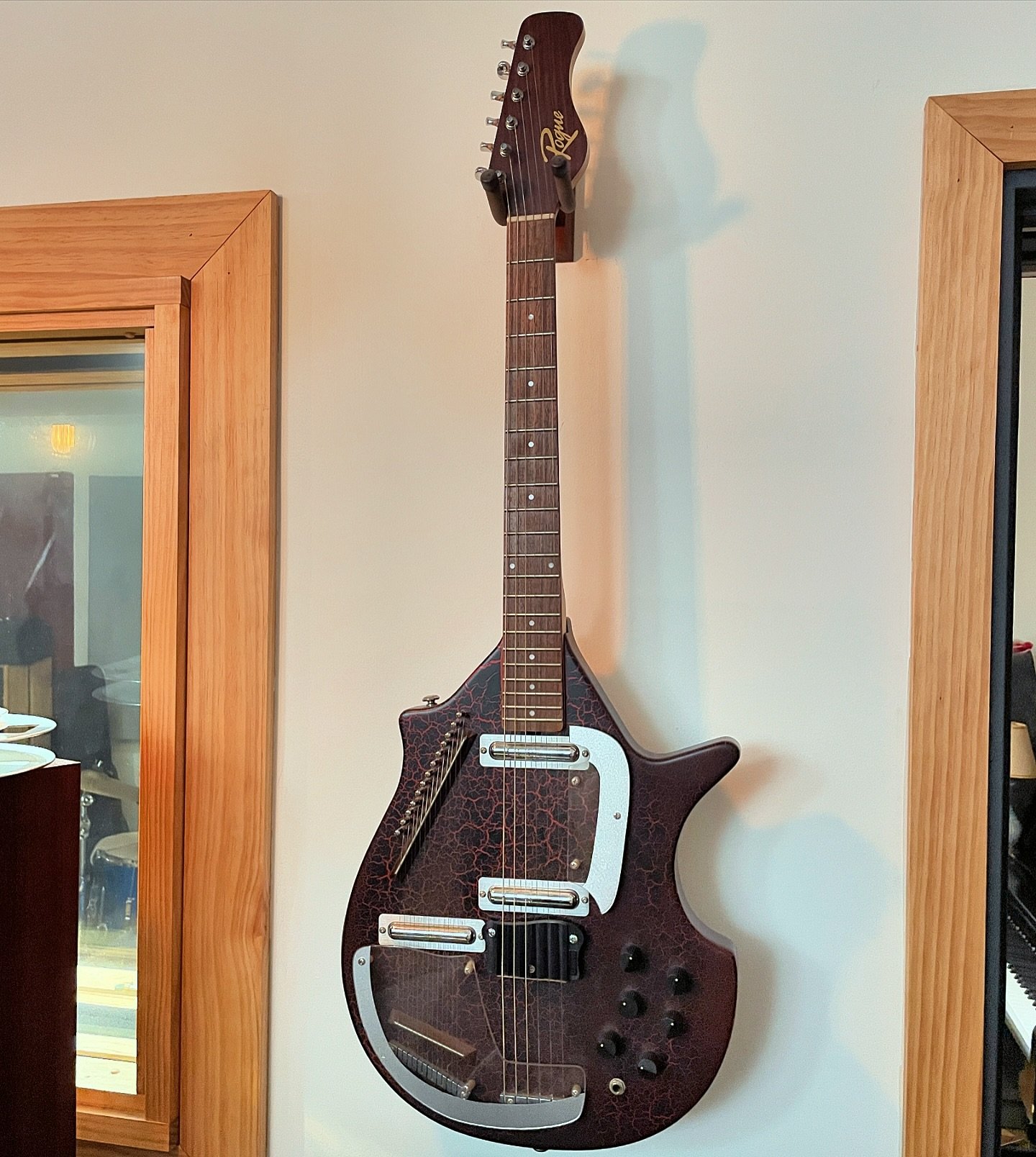 Finally hung this bad boy up on the wall. Our Rogue STR-1 Electric Sitar Guitar. Ready for ya 😈