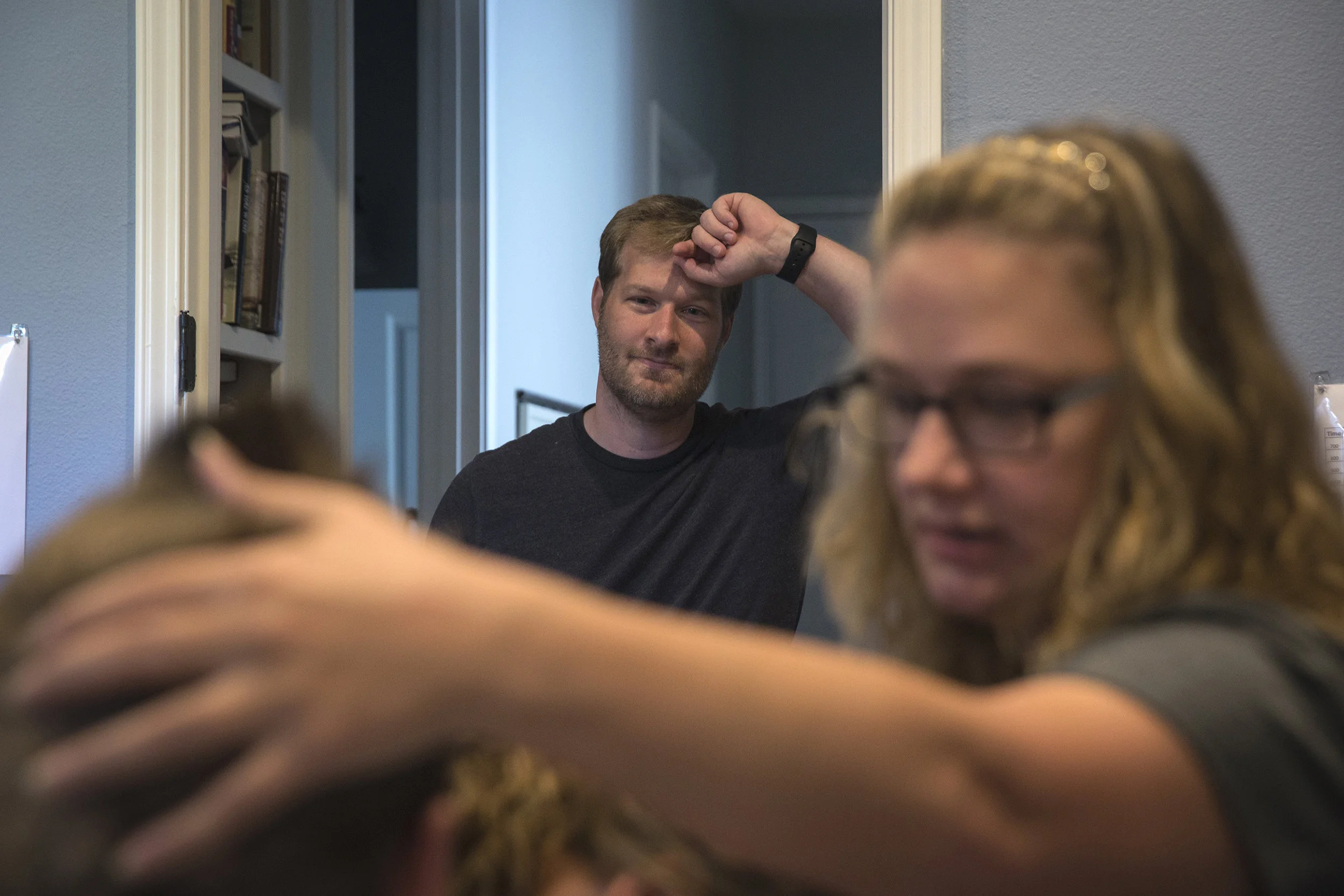  On Oct. 26, 2017, Chris Sears watched as friends of the family and his wife Jenny Robson help lift 10-year-old Ben Sears from his bed and into a standing device.&nbsp; 