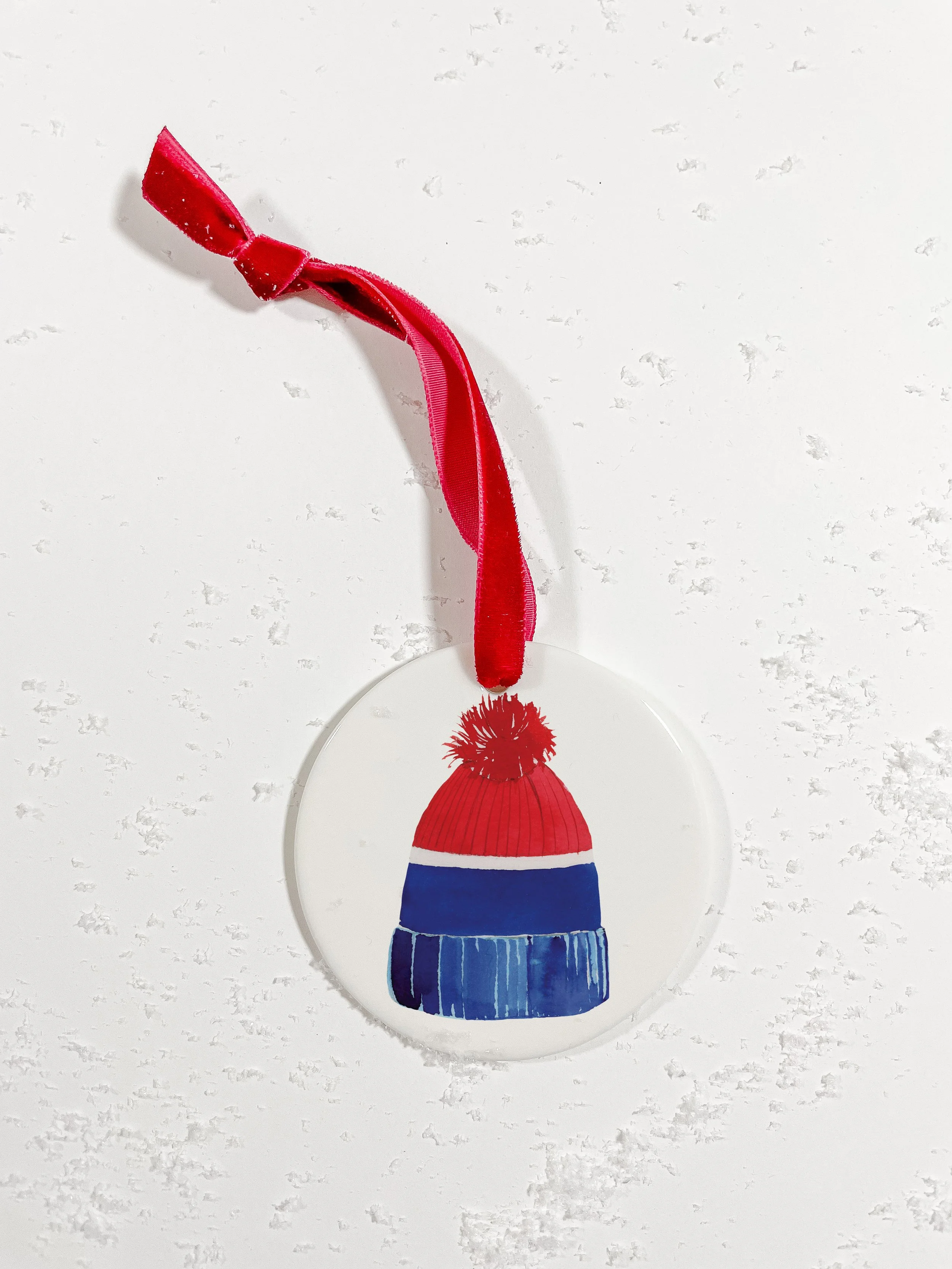 Red&Blue Hat-Coin Ornament-Red Ribbon-Mock Up.jpg