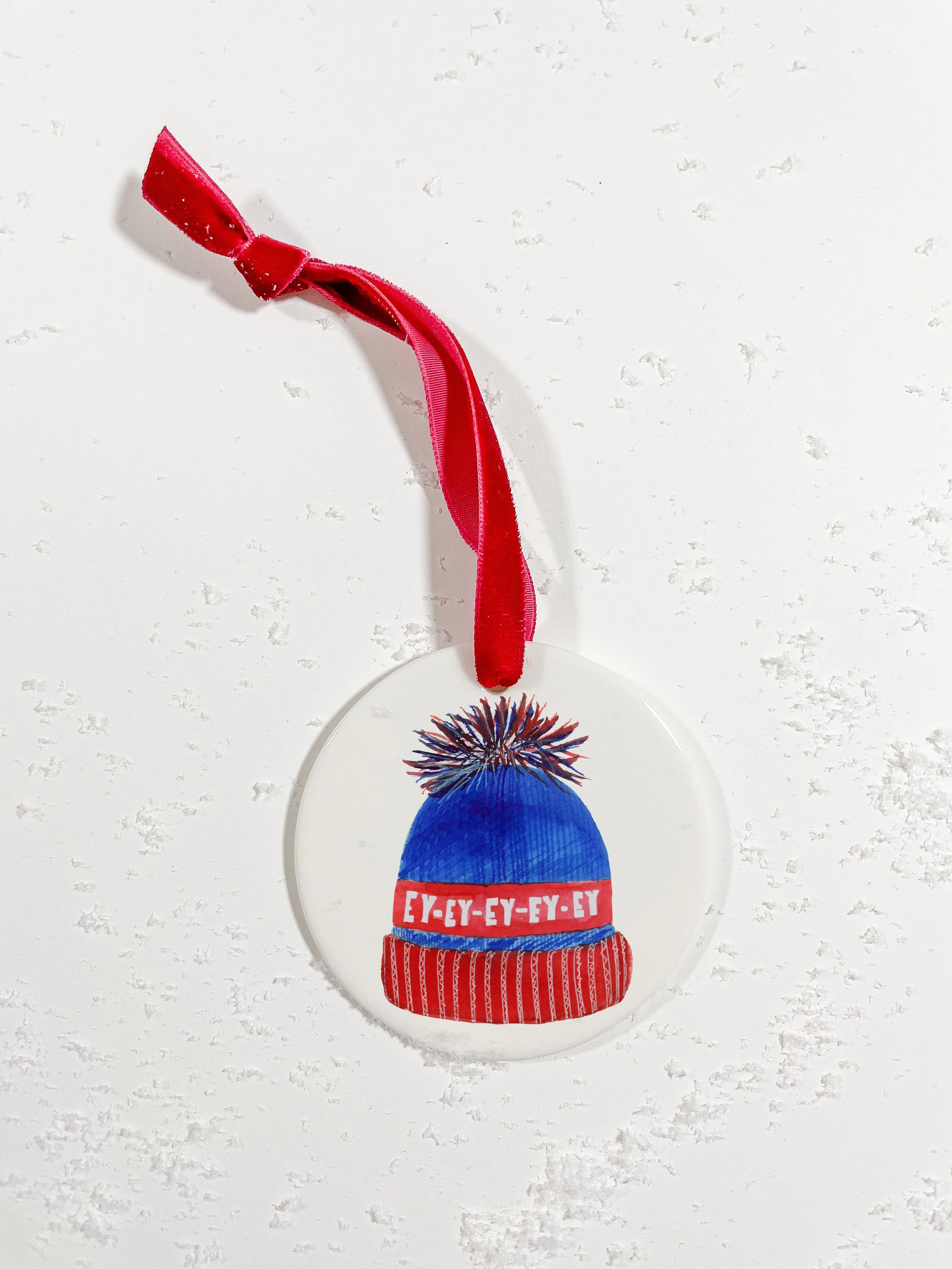 EY-EY-EY Hat-Coin Ornament-Red Ribbon-Mock Up.jpg