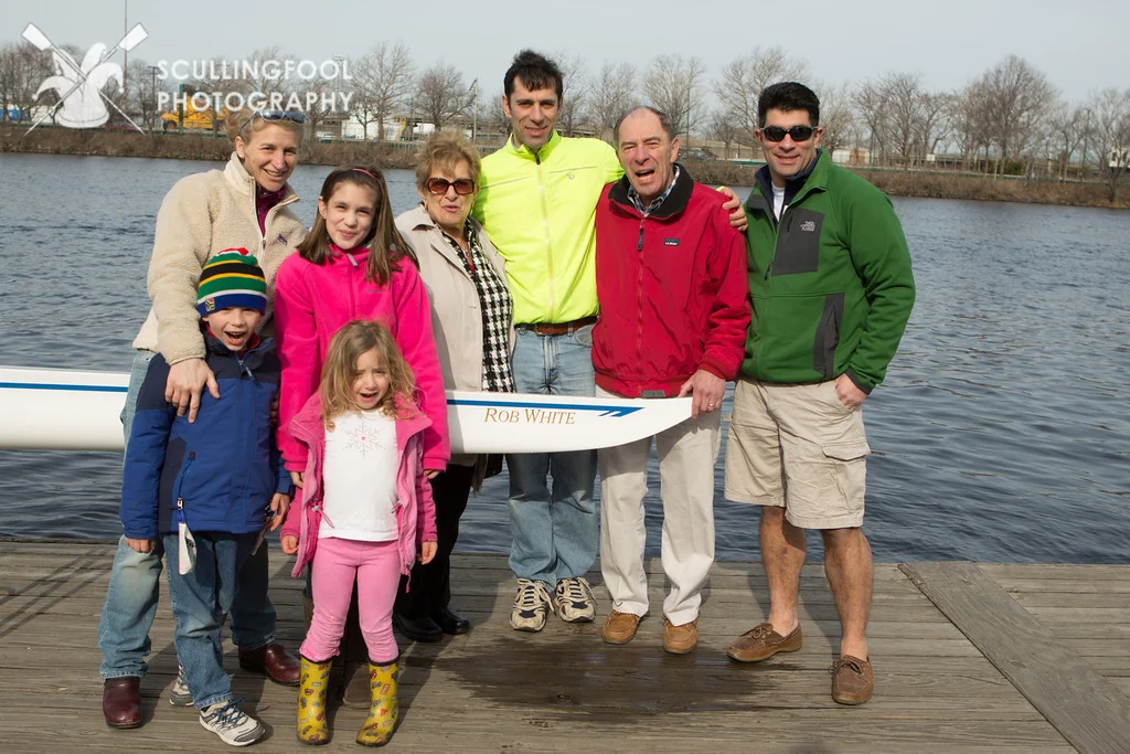 Rob with his family at his boat dedication.