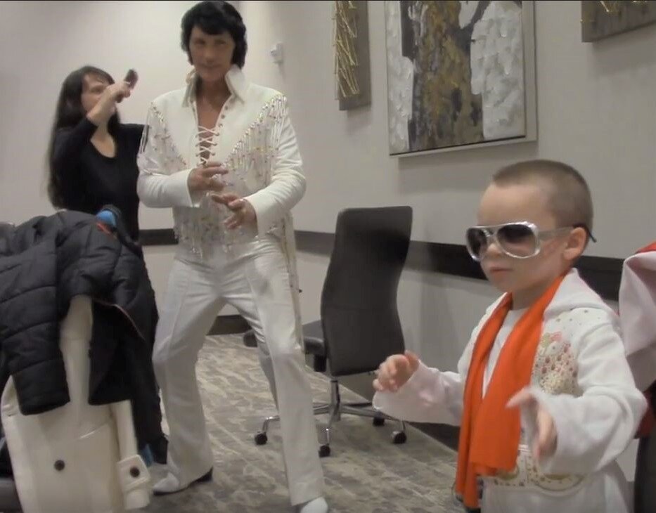 Michael and Kid in Elvis suit.jpg