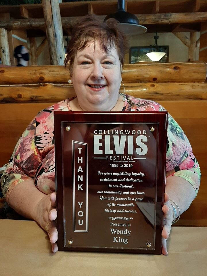 Wendy King and her award.jpg