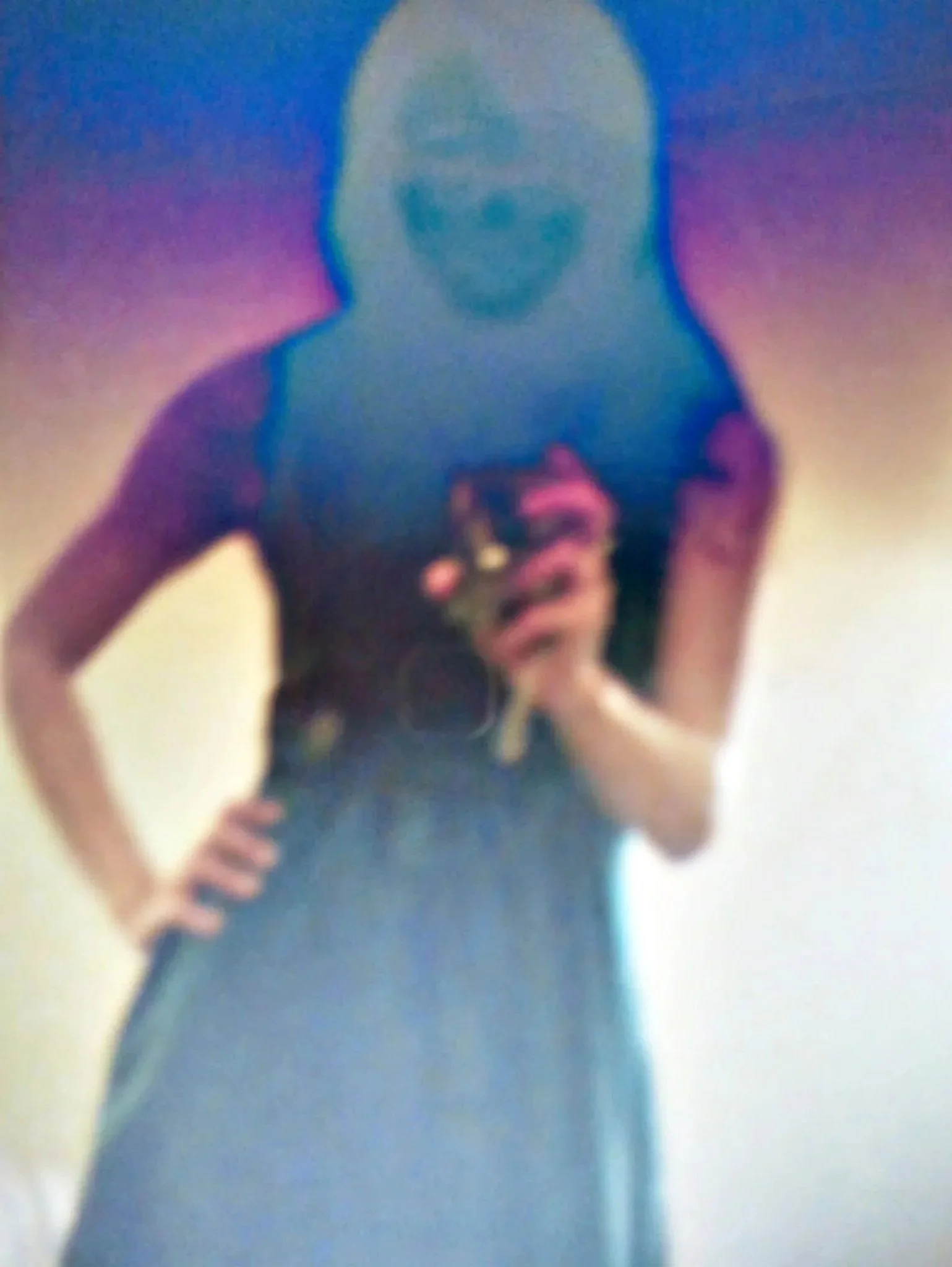 Image of a figure with features obscured as if on film negative