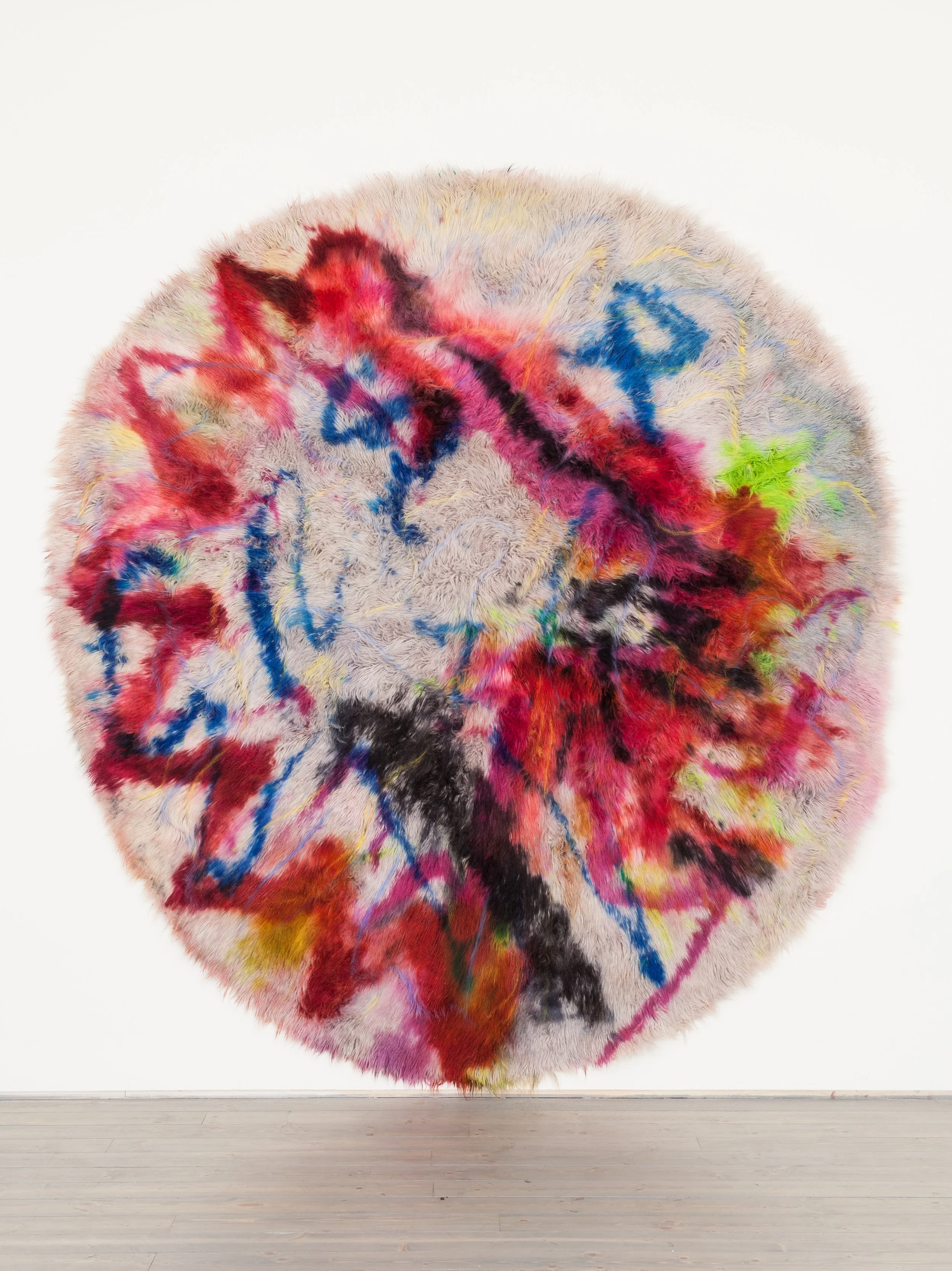Thicker Ticker, 2014, cochineal, acid dye, wool rug, gel, chalk pastel, hair spray, 8’ round.