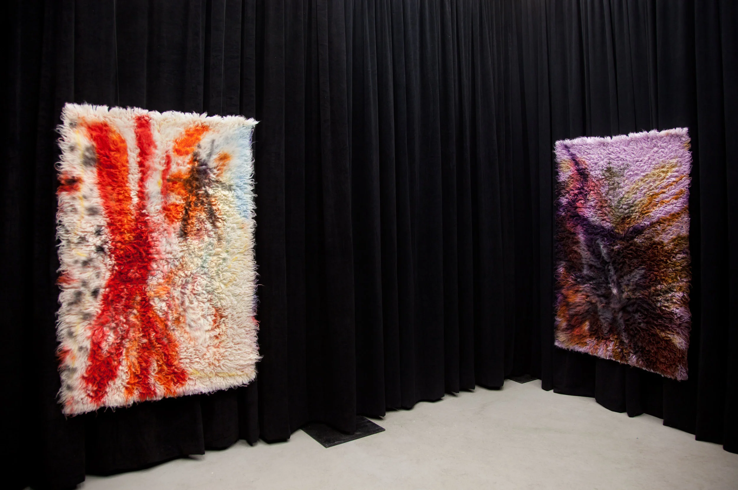 (Left) Sticks and Stones , 2017, wool rug, acid dye, hairspray, chalk. (Right) Straw and Clay, 2017, wool rug, acid dye, hairspray, chalk.