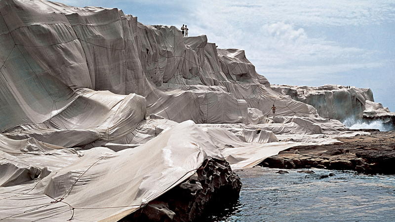 Wrapped Coast, One Million Square Feet, Little Bay, Sydney, Australia (1968-69) - Christo and Jeanne-Claude. Photograph: Shunk-Kender © J. Paul Getty Trust. All Rights Reserved