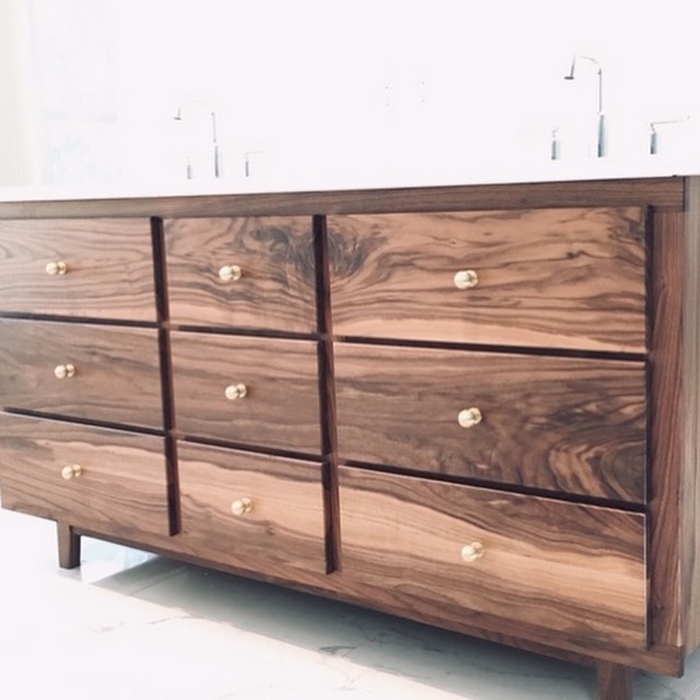 We are incorporating our custom designs into the world of built-in cabinets &amp; custom vanities! We made this walnut vanity base for some past clients who decided to add on to their existing home #madebyregiven