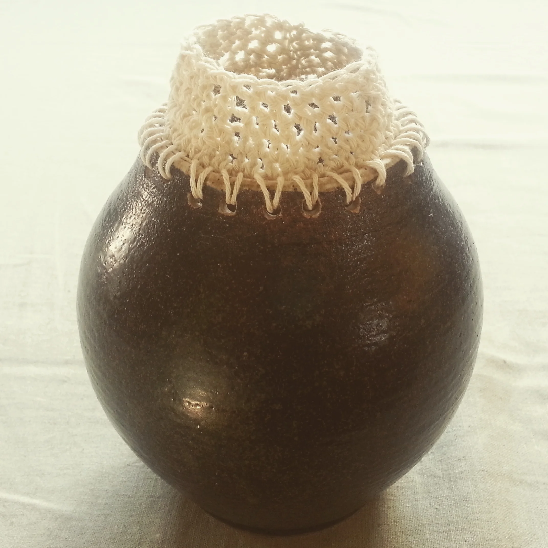Vase with crocheted neck