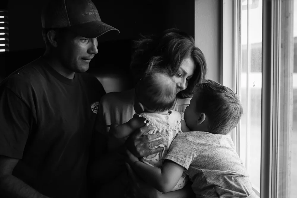Tonya Edwards | Oroville Photographer | family of four in window light
