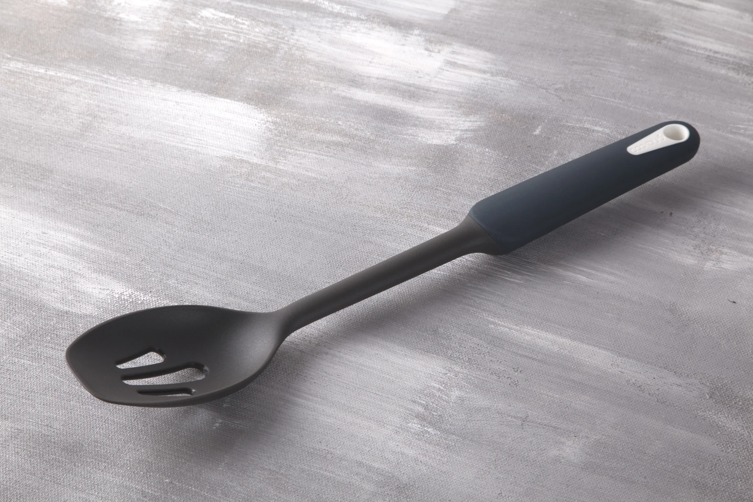 Slotted turner