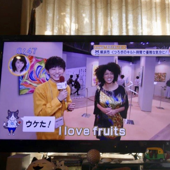 My interpreter’s husband was kind enough to take a few shots from his TV! I’m still trying to figure out the context of “I love fruits”… lol